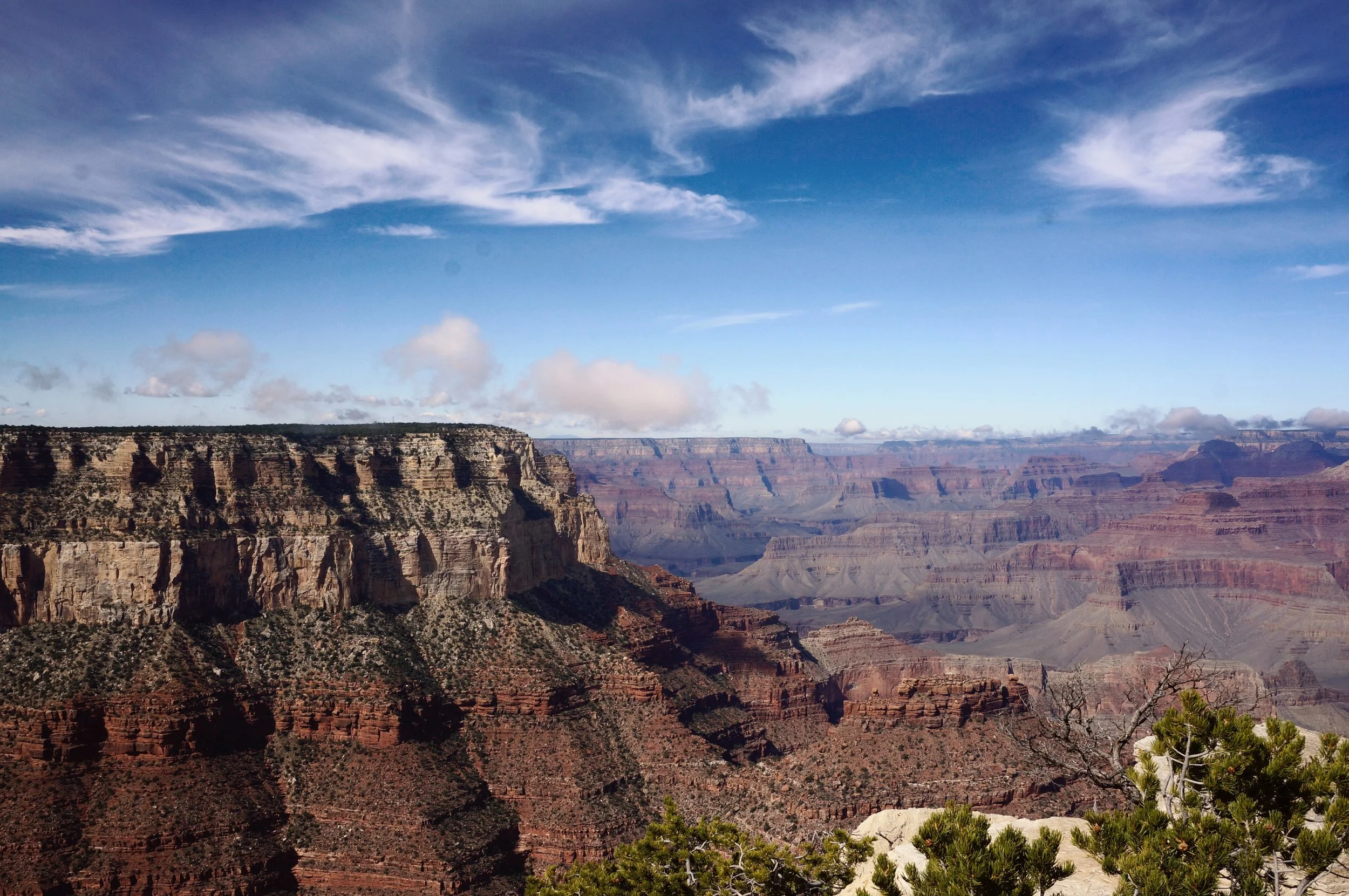 Grand Canyon landscape with cliffs and blue sky