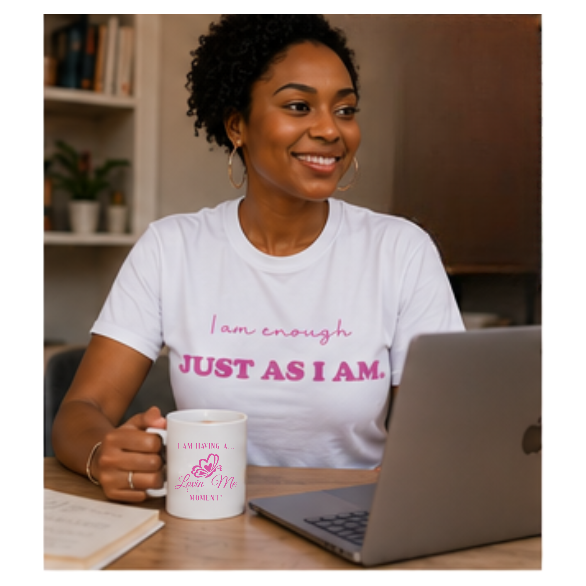 Homepage image
Woman wearing a white “Just As I Am” T-shirt, holding a Lovin’ Me mug beside a laptop.