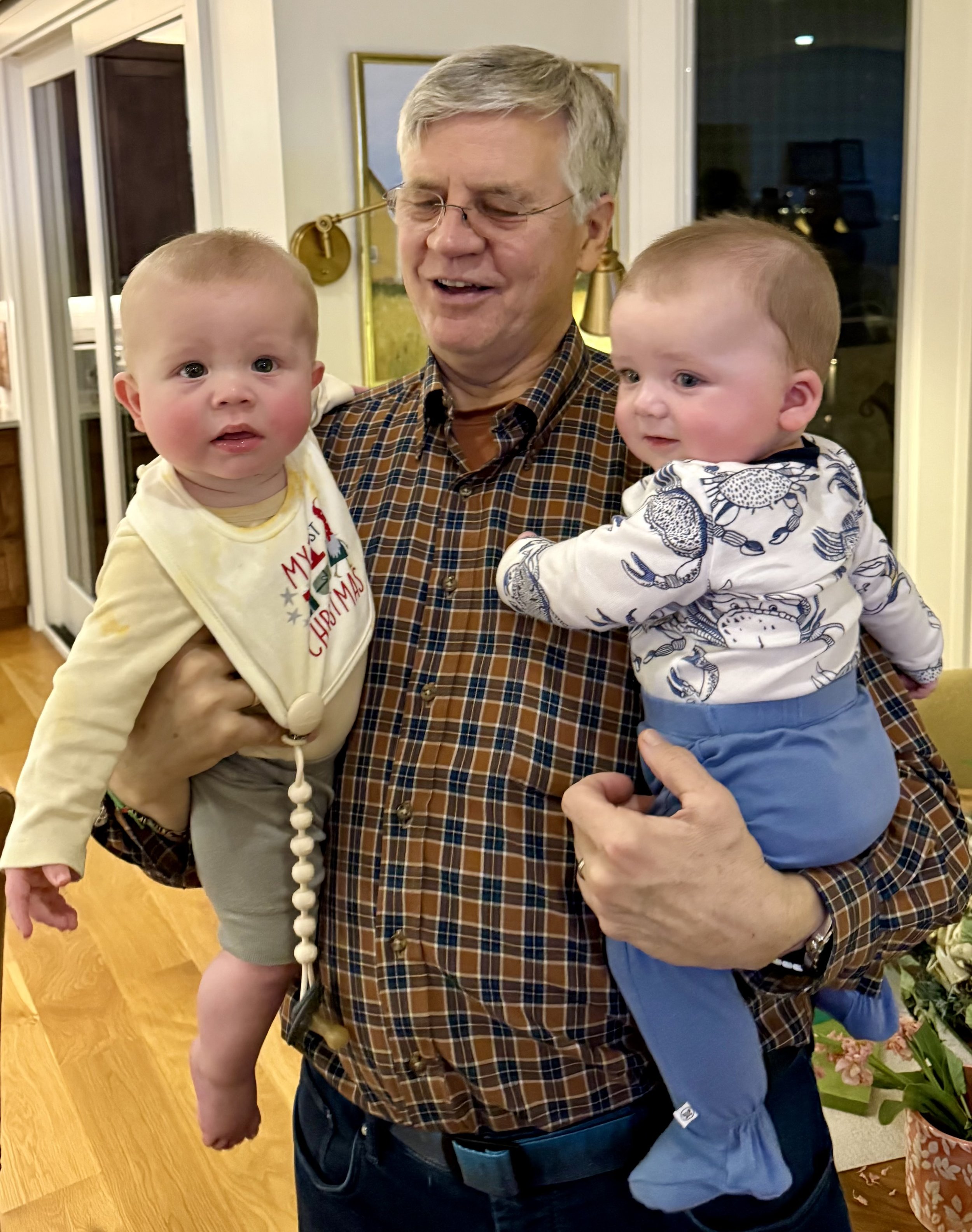 Dr. Leigh with his grandkids.