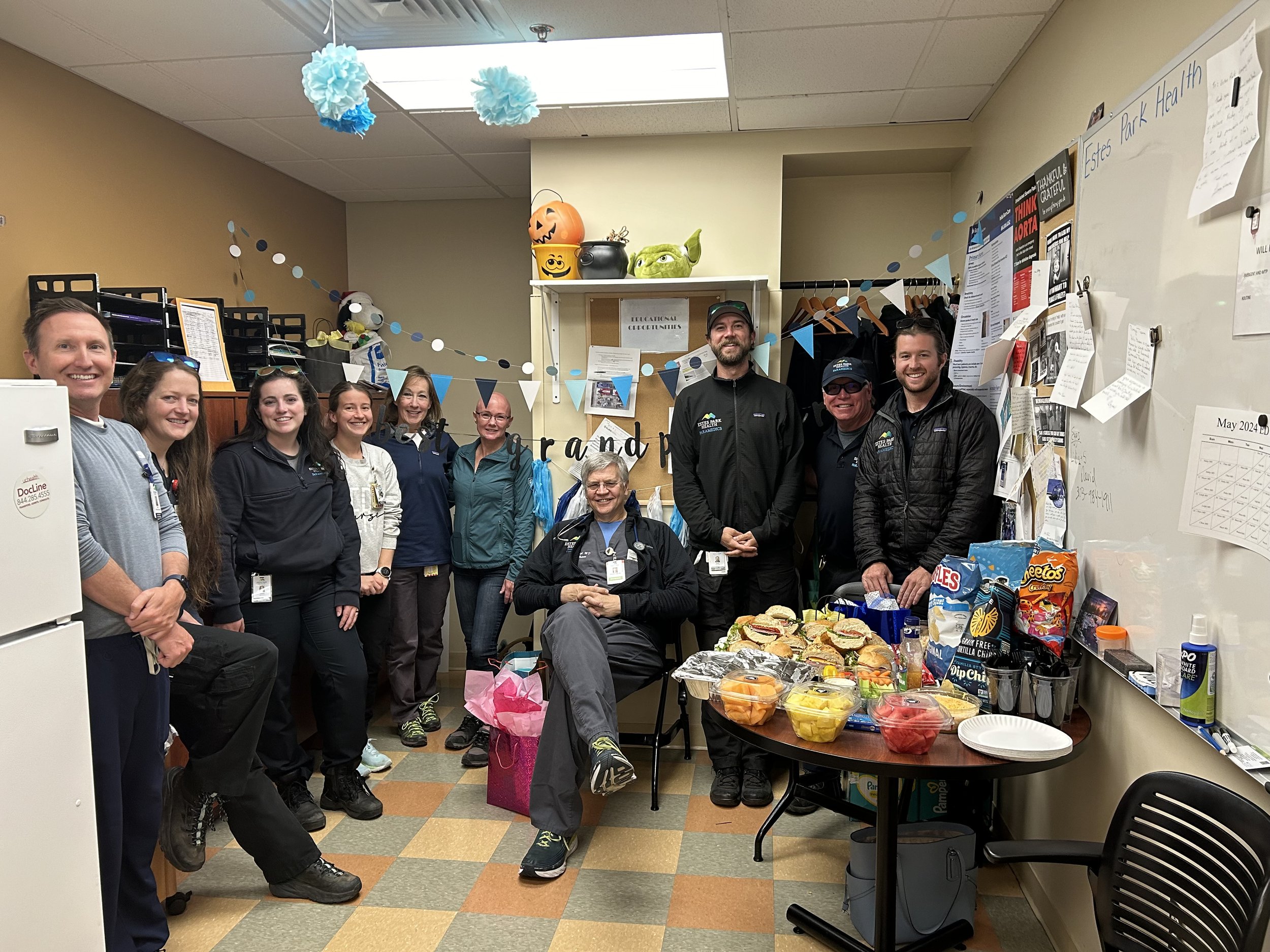 Dr. Thomas E Leigh with his coworkers