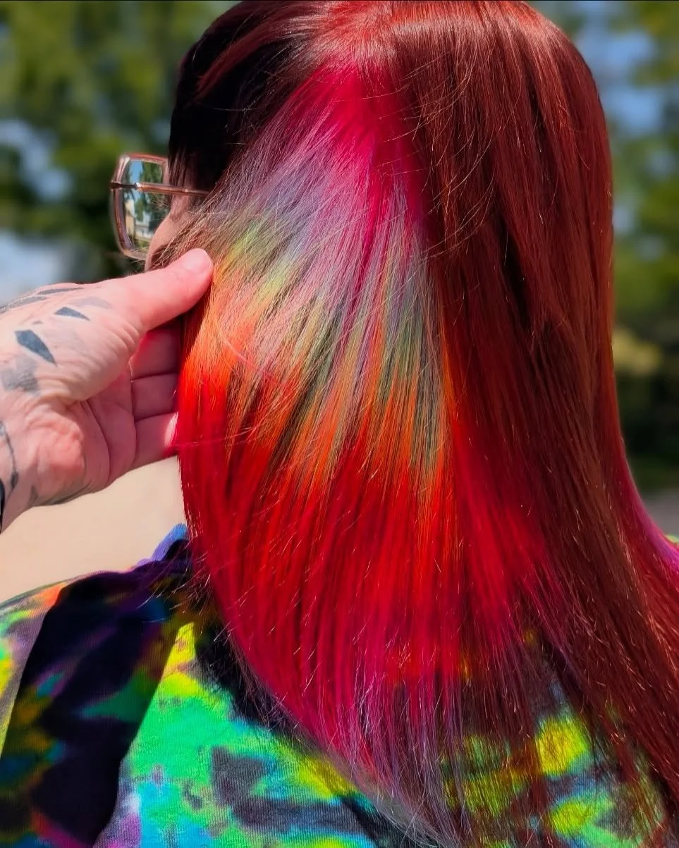 When your hair says &ldquo;I&rsquo;m chill&rdquo; but also &ldquo;I might steal the show.&rdquo;🔥🌈

Custom vivid placement. A little rainbow prism for good measure. And a mullet that seriously knows how to show it all off. 😎

Hair Artist&mdash;&gt