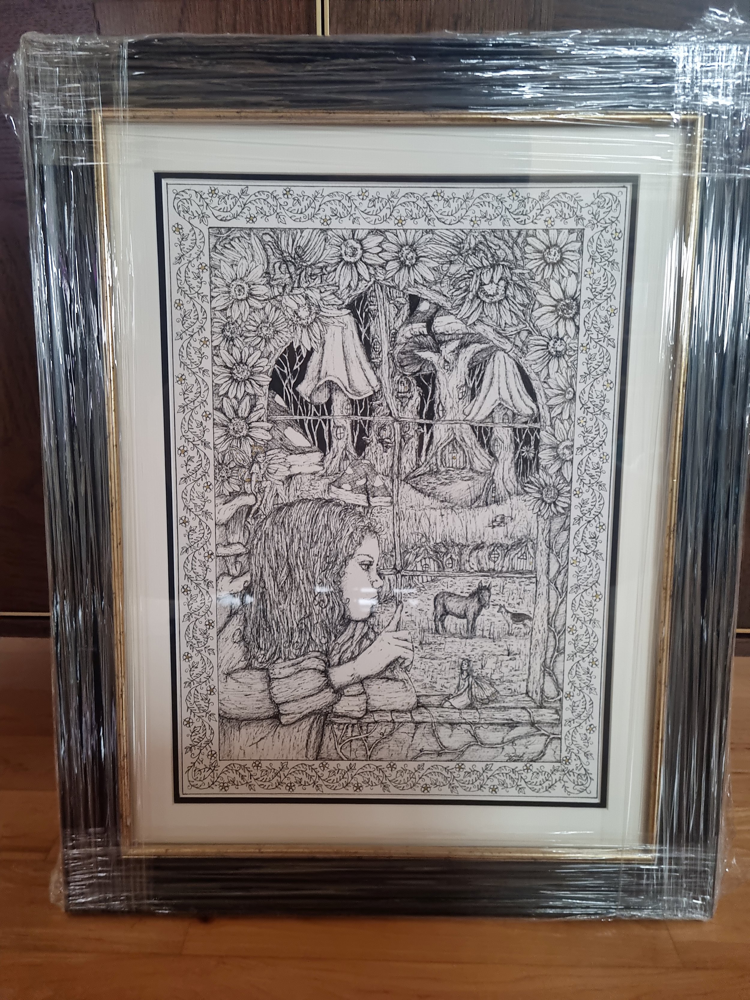 Black and white framed coloring page depicting a girl with curly hair, looking at a forest scene with trees, mushrooms, flowers, a horse, and a small girl sitting on the ground.