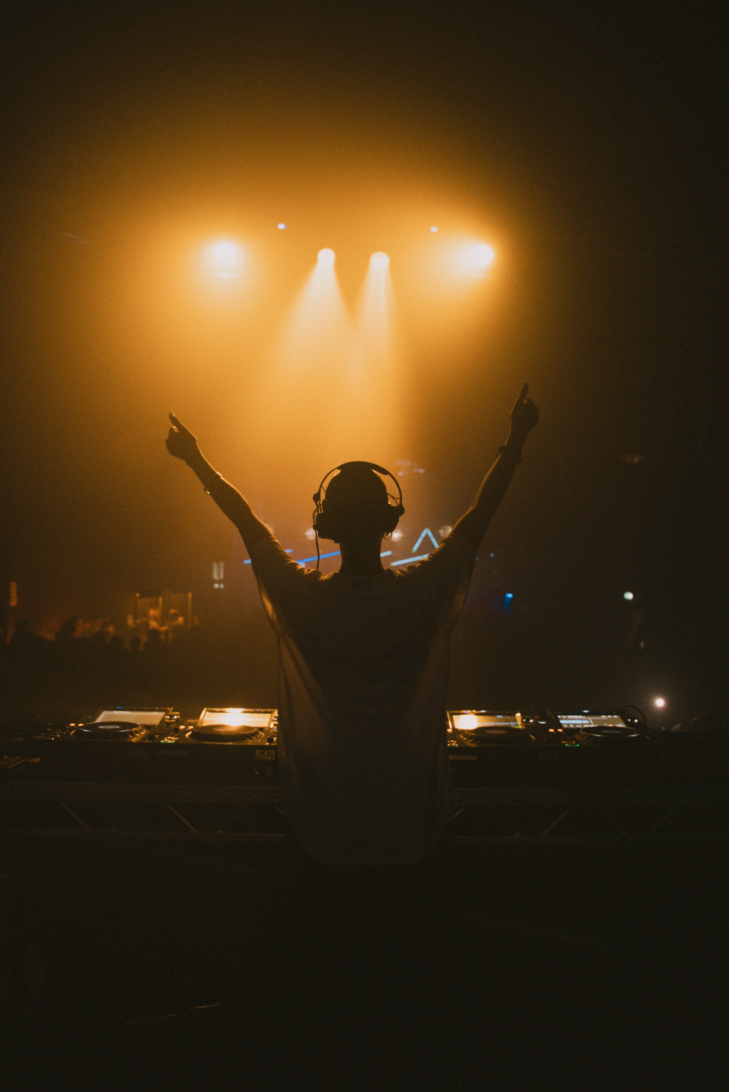 DJ performing live at a show, photography by BGL Media