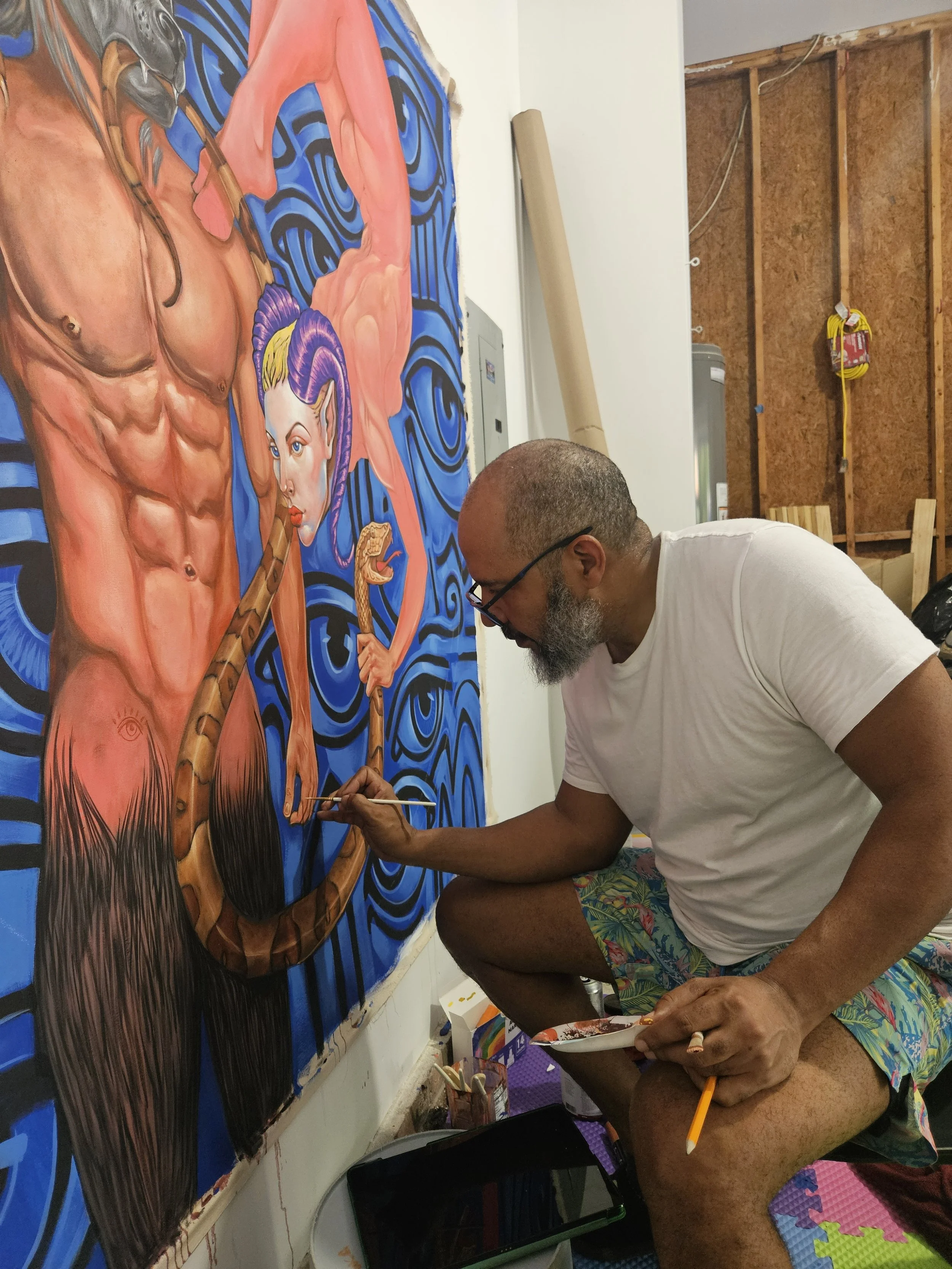 Edward Telleria adding detail to Plenitude, nearly finished, in his studio