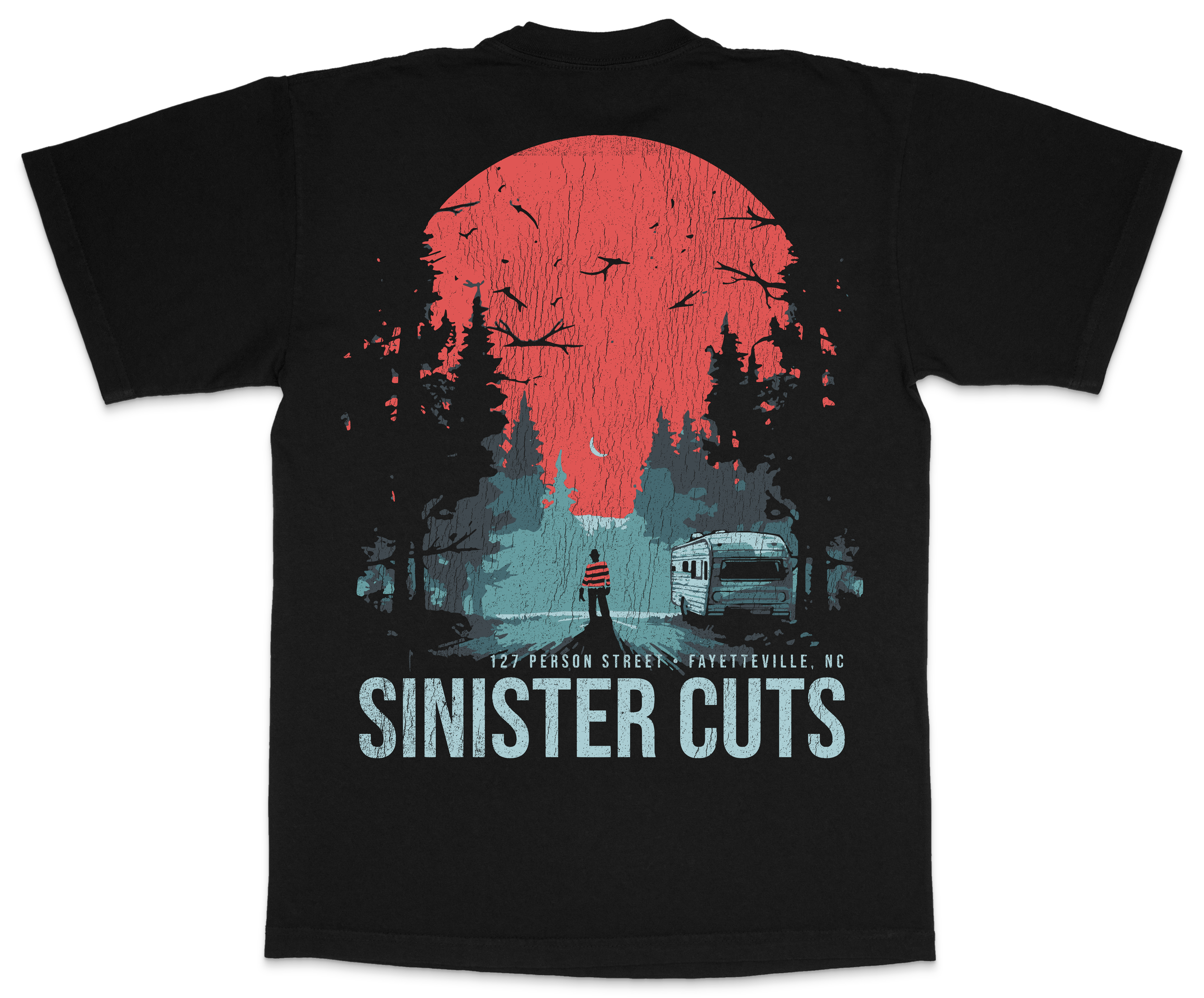 Black T-shirt featuring a graphic design of a red moon, dark trees, and a figure walking with a dog. Text reads: "127 Person Street - Fayetteville, NC" and "Sinister Cities."