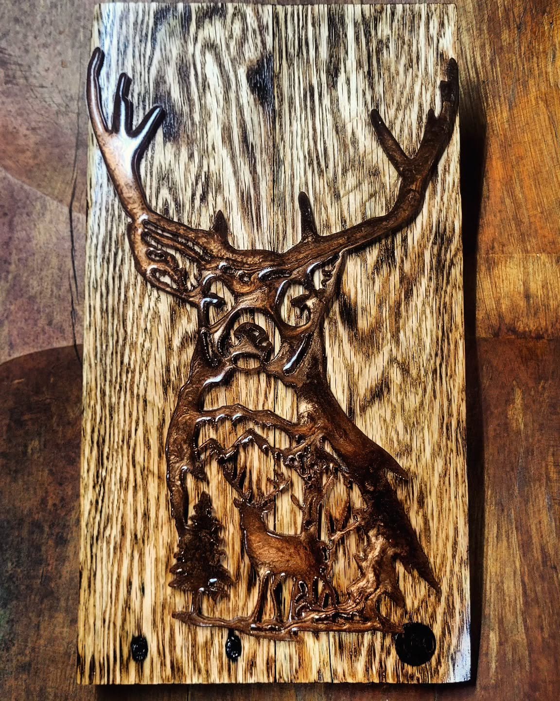 The Big Buck Wall Hanger
.
Reclaimed burned grain oak pallet wood with @superclearepoxy copper brown color molded deer scene
.
A perfect rustic style decoration for a true outdoorsman
.
This will be available to order once I put the final touches on 