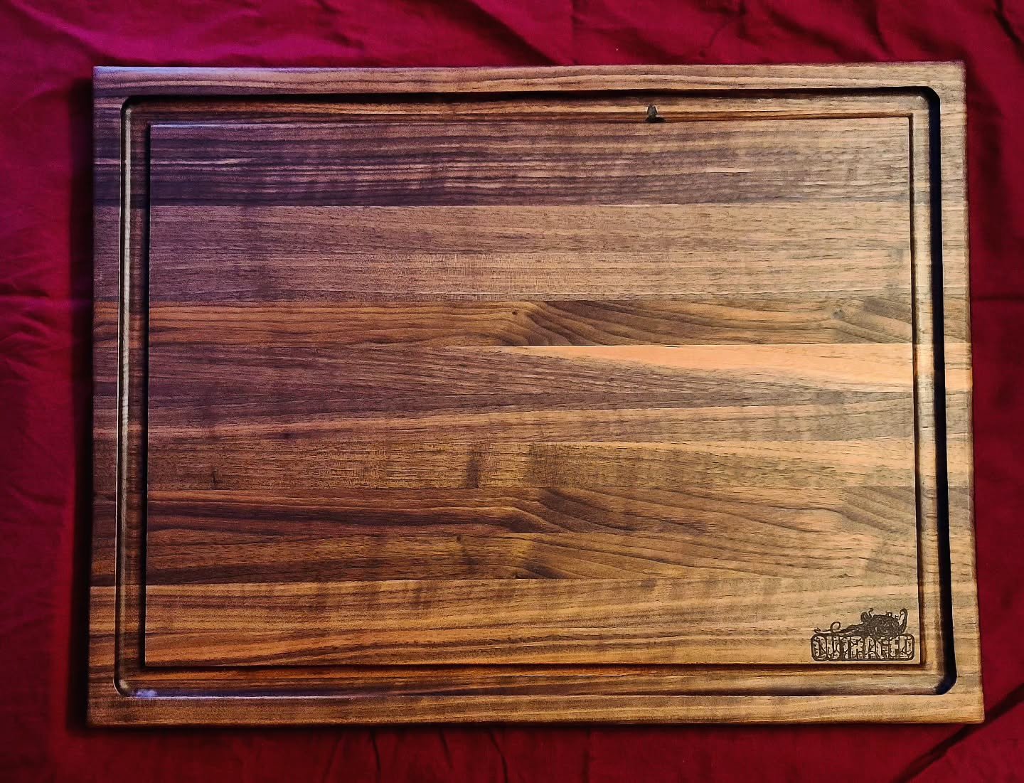 Outraged 🐙
.
Loving all these walnut board requests, final products always look amazing
.
Measuring 23"&times;17"&times;1.25" with juice groove and custom etching
.
Also making a Mini Mjolnir Meat mallet from the same wood to match th