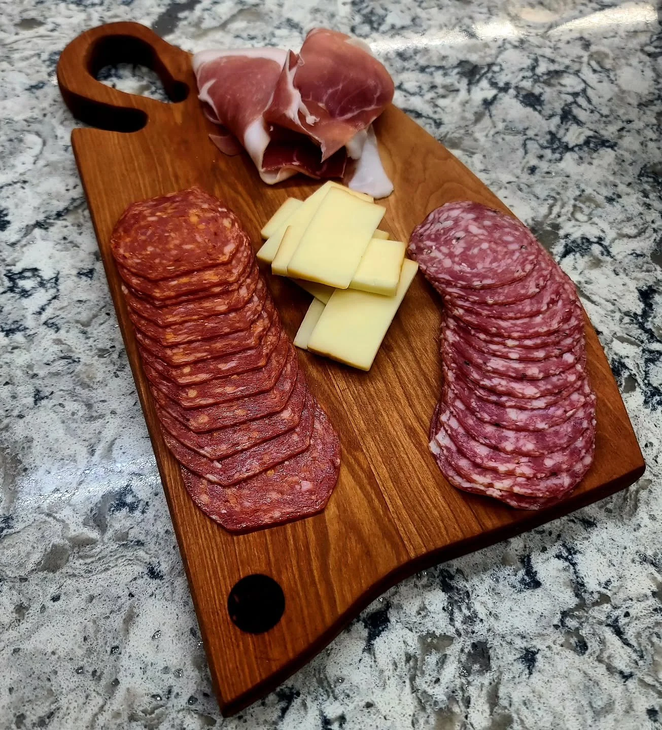 Handmade charcuterie boards make the meats and cheeses taste even better, they say you eat with your eyes first.
.
Working through lumber stock to get more of these up on the website very soon.
.
Still have a few of these cherry boards left as well! 