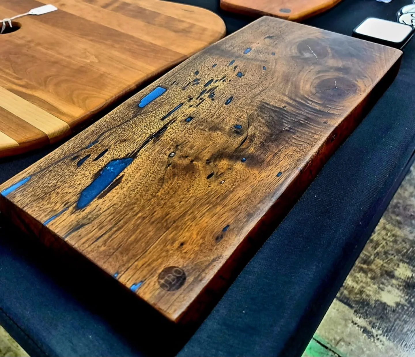 Enter to win the "Little Lakes" Live Edge Walnut Serving board today! 
.
This board can be yours for as little as $15, and  there is no limit to how many entries you can obtain. Entires can be purchased up to 11:59 pm, October 20th 2025 and