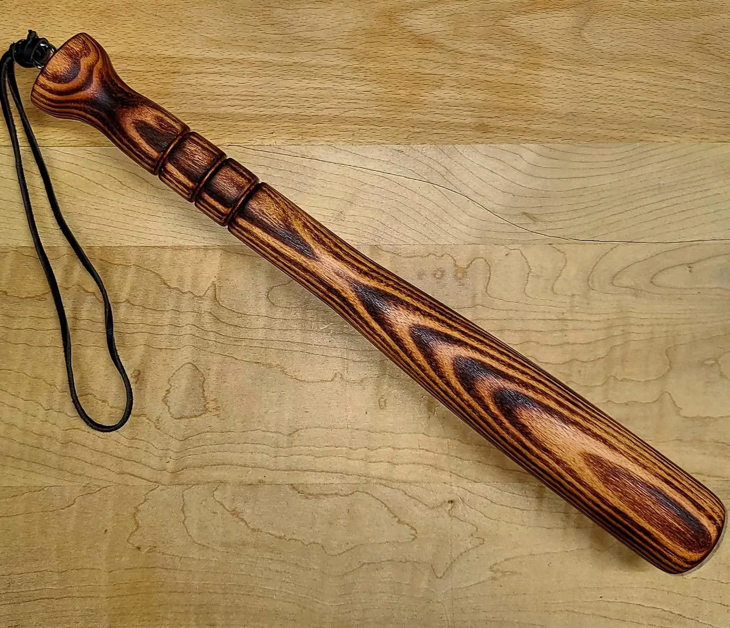 Batter up! 14 1/2" Torched Black Locust Mini Bat w/ Black leather strap
.
Sometimes you put a raw hunk of wood on the lathe and let her rip with no plans, and hit a homerun.
.
Who wants one?! 
.
#jbowoodcraft
#homerun
#minibat
#blacklocust
#torc