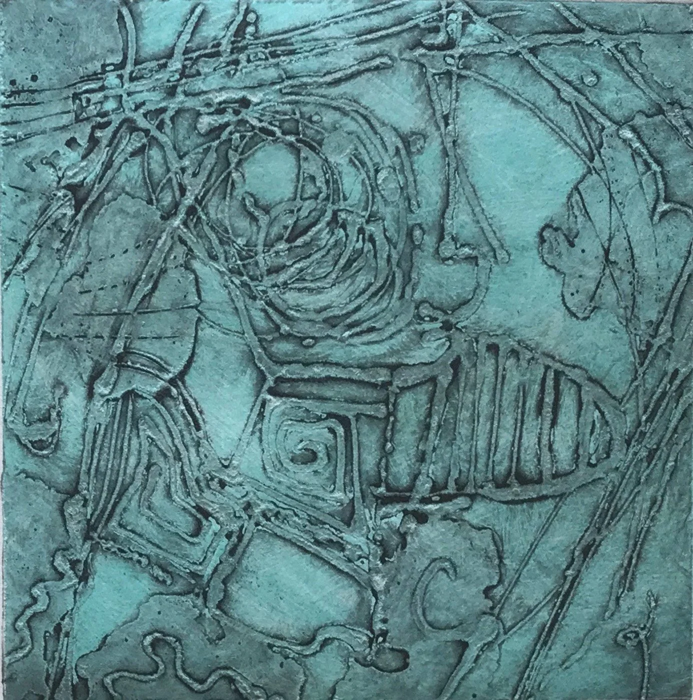 A detailed etching of a human skull with intricate line designs and some decorative elements, possibly in an artistic or anatomical style.