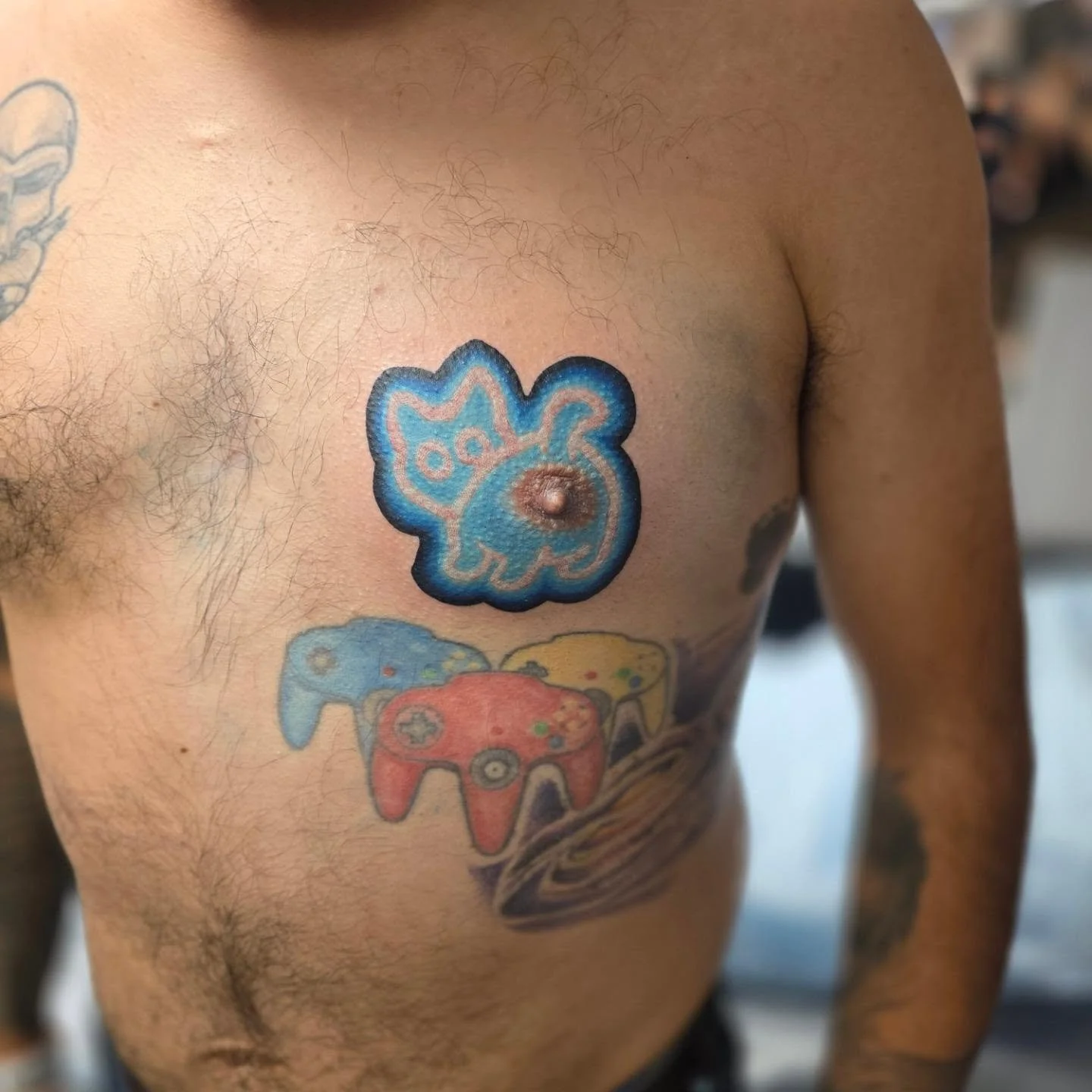 Nipple Neon Kitty @seattletattooexpo 😂🤌🏻

#neon #neontattoo #Seattle #seattletattoo #SeattleTattooExpo