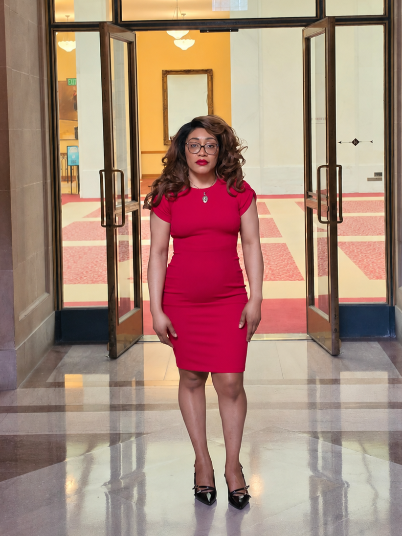 Attorney Sauve M. Sonkey inside South Light Court at San Francisco City Hall.