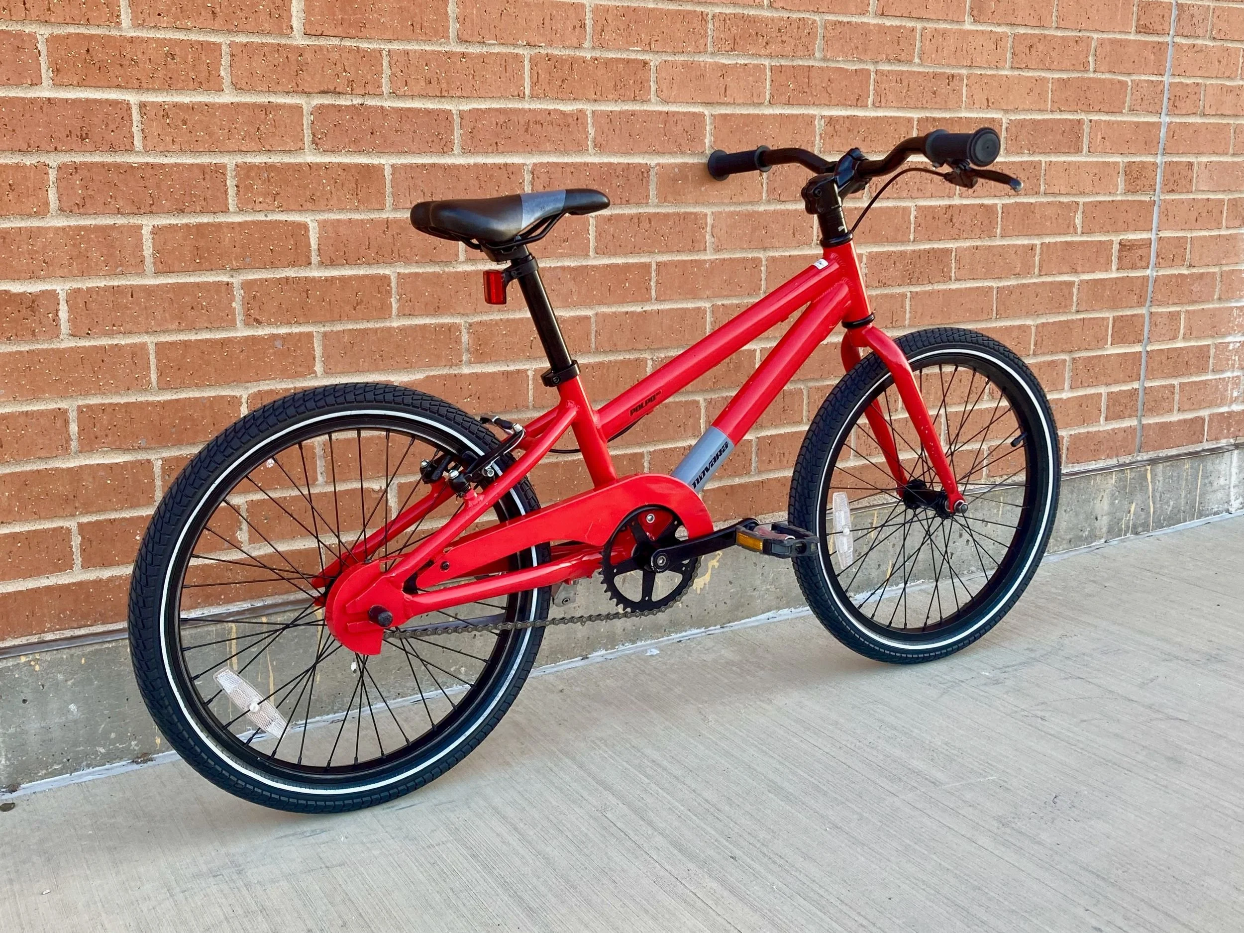 REI Novara Polpo (Ages 6–9), rear three-quarter view