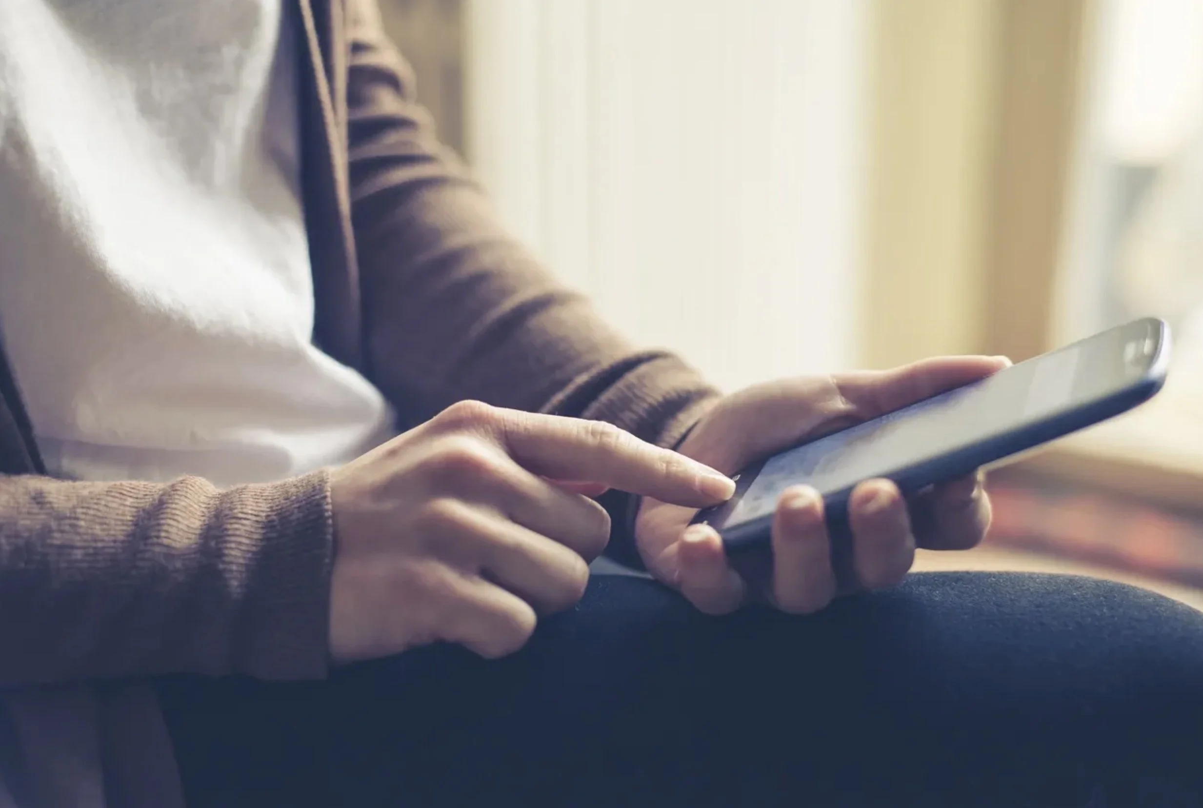 teen engaging in telehealth video call for ClearAdhere medication adherence solutions