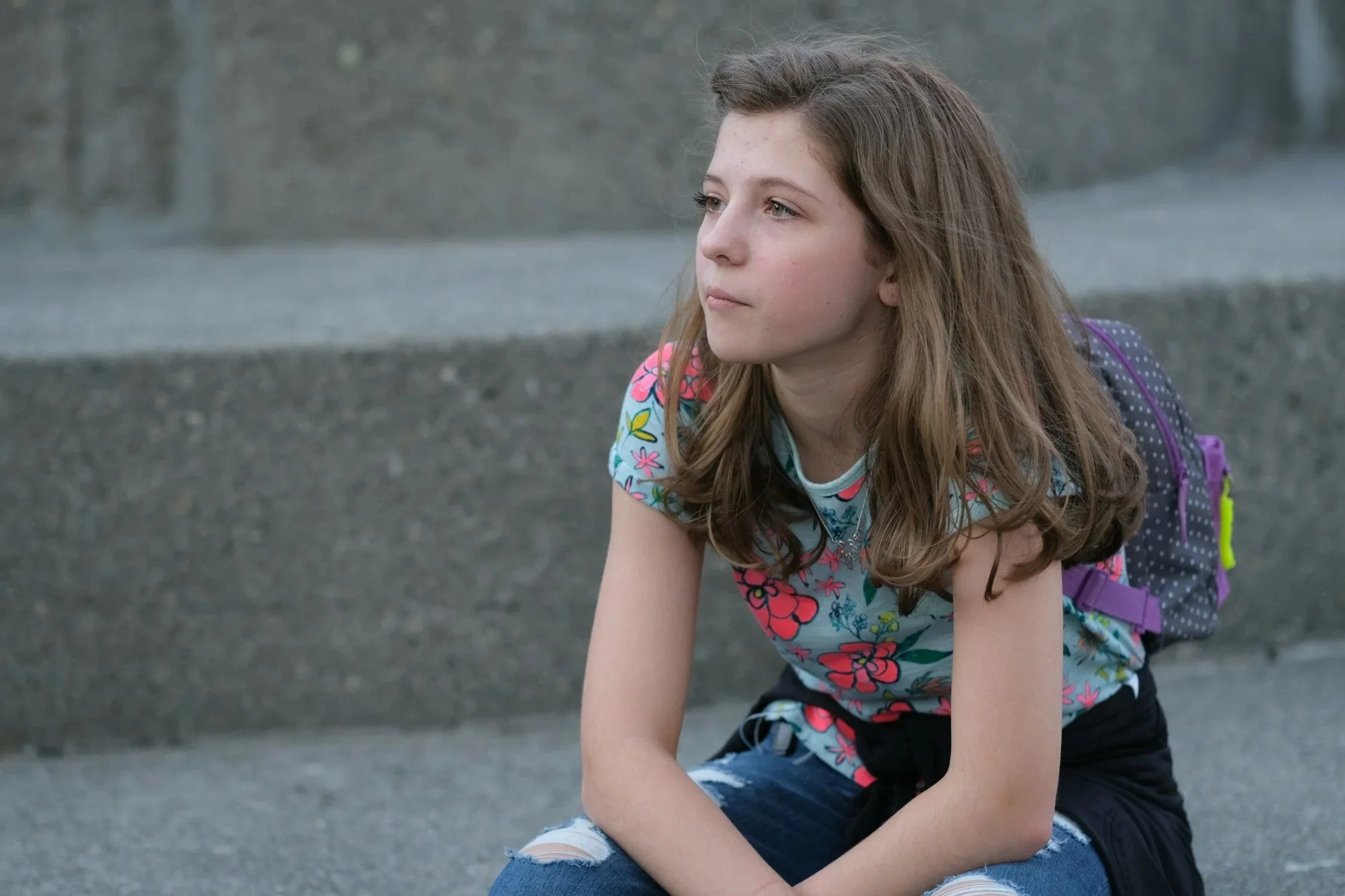 teenager waiting outside