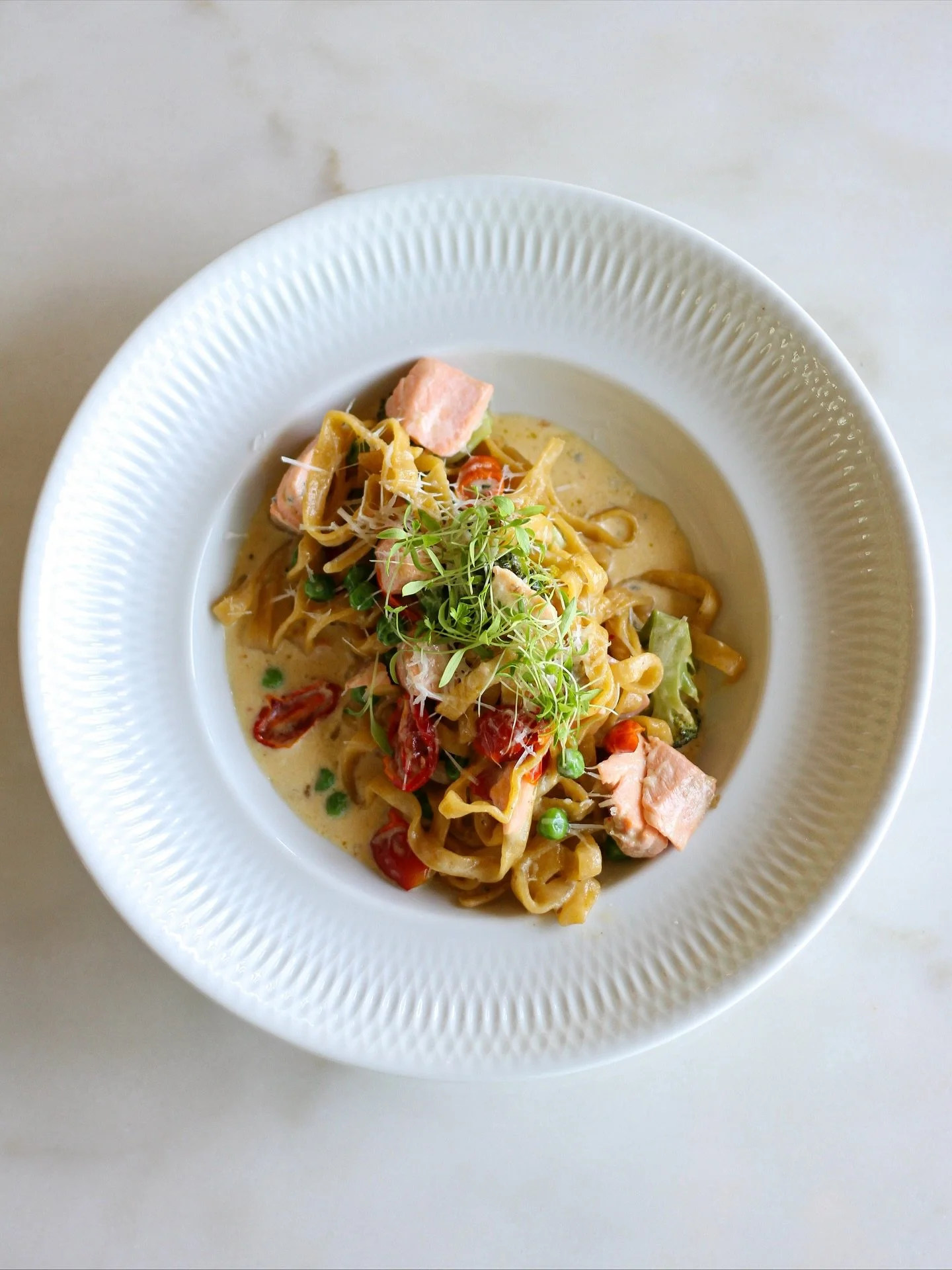 We combined freshly made tagliatelle with creamy cheese sauce, tender salmon, crisp broccoli, sweet green peas, and a sprinkle of lemon zest. The result? &ndash; a harmonious balance of flavors and textures that captivate your buds.

#freshpasta #tag