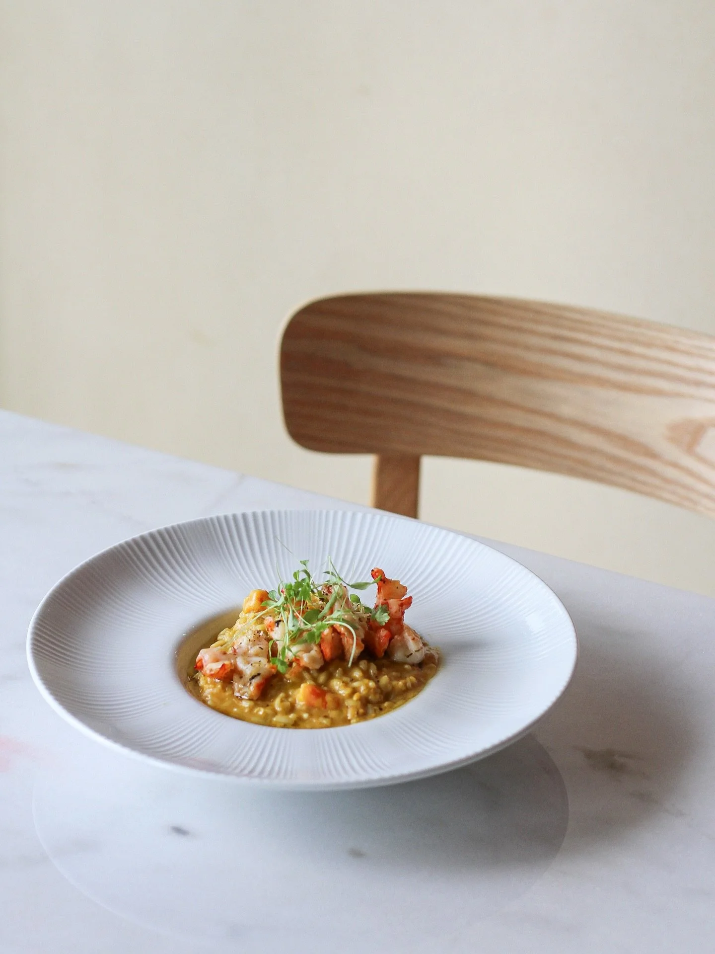 Our signature Risotto Milanese e Gamberoni is a truly exquisite harmony of flavors 🍤

It&rsquo;s crafted with aged Acquerello rice, revered for its delicate, nutty texture and exceptional ability to absorb the richness of the broth.

The golden hue 