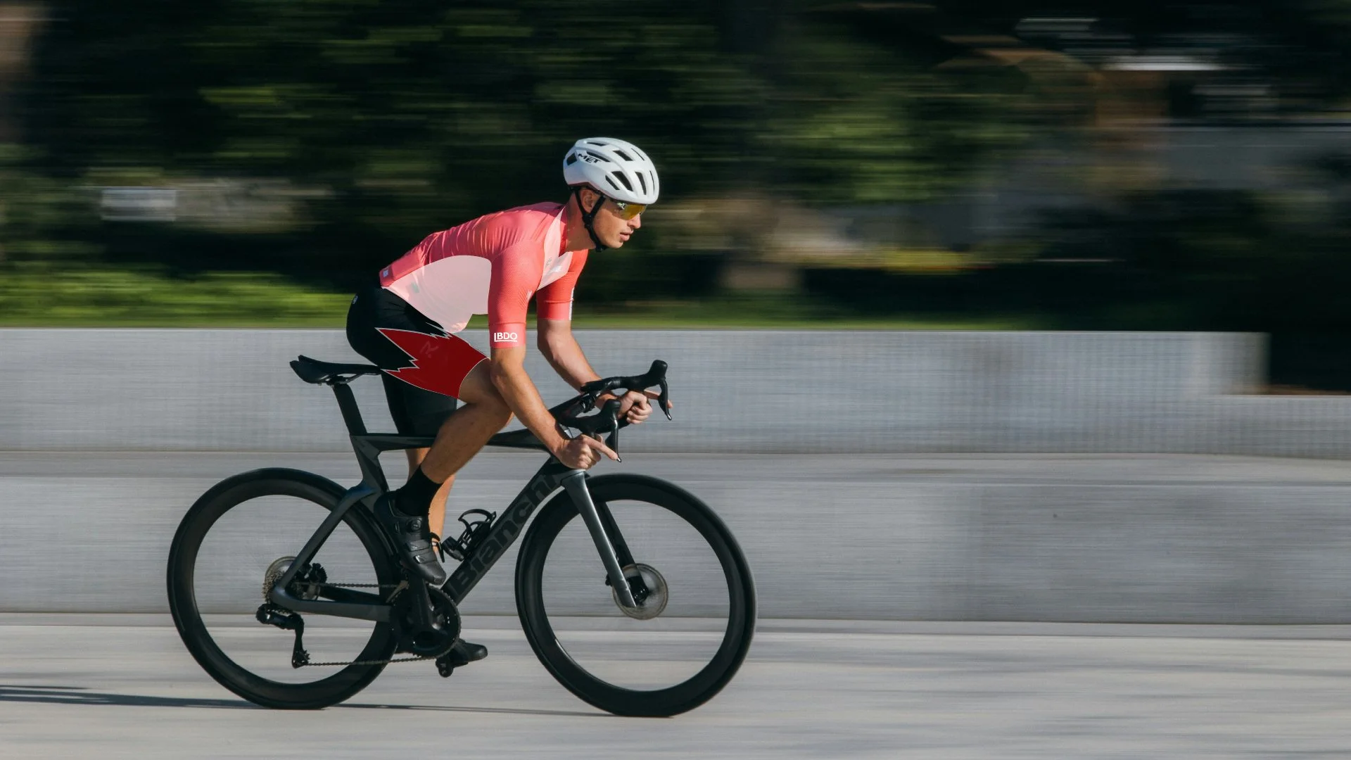 Photo of road cyclist with overlay of BDO cycling kit