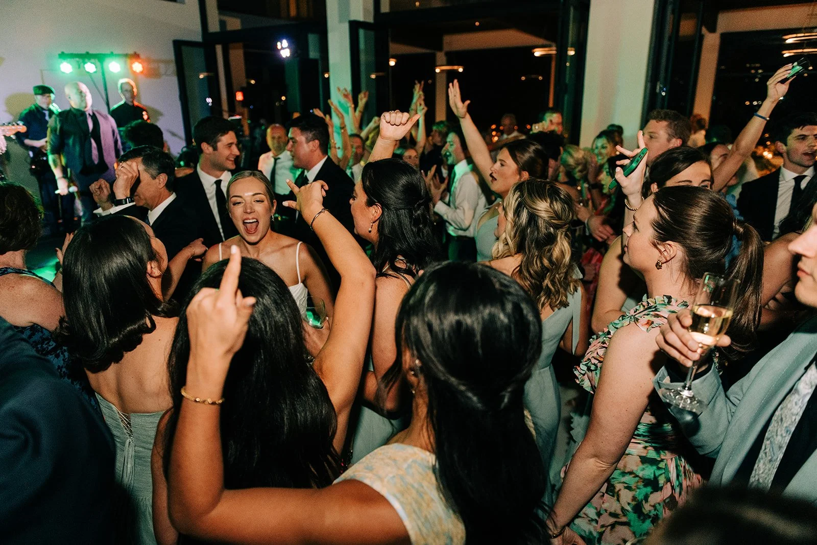 Packed dance floor next to band