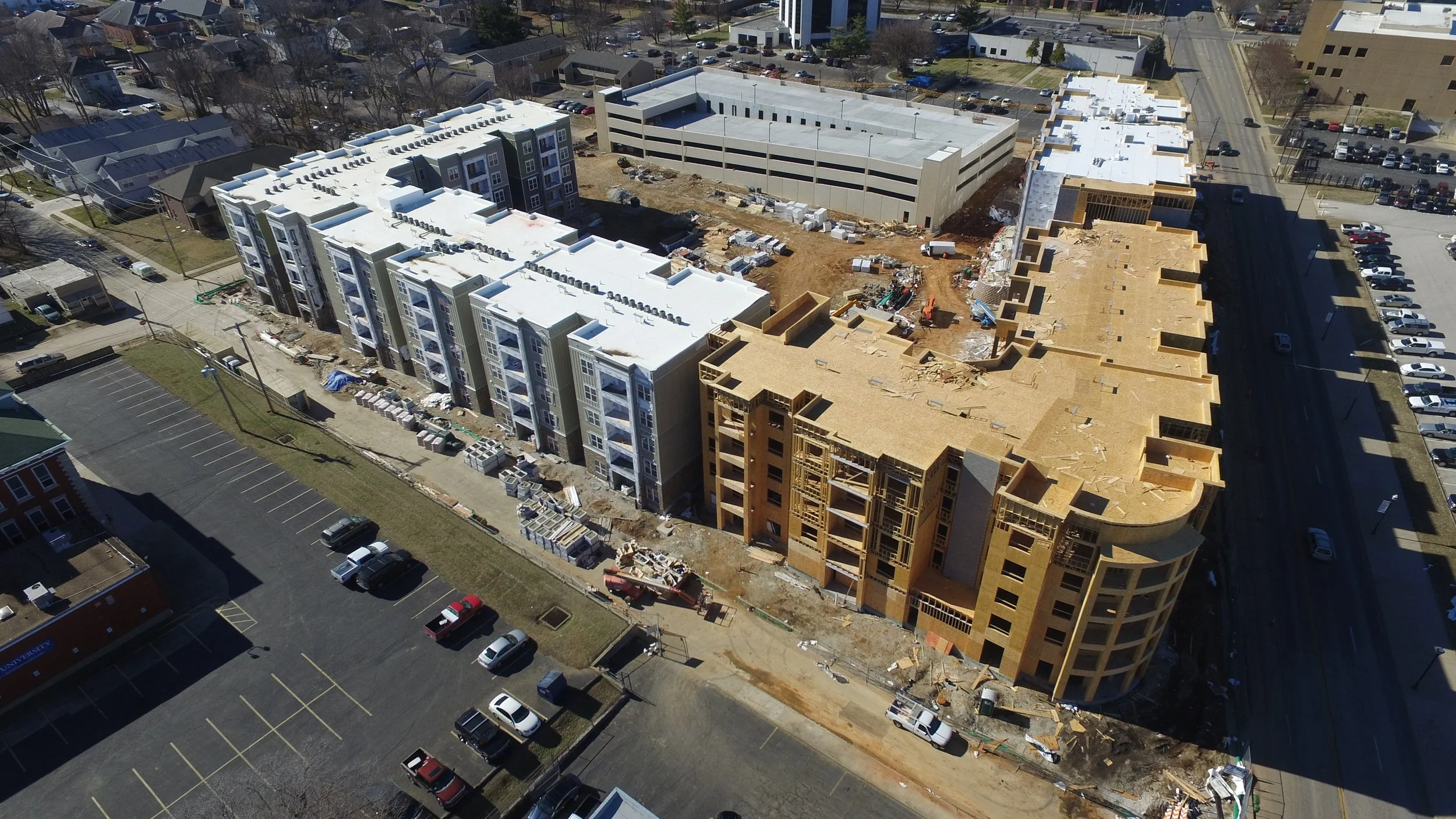 An apartment complex that is under initial construction large construction job