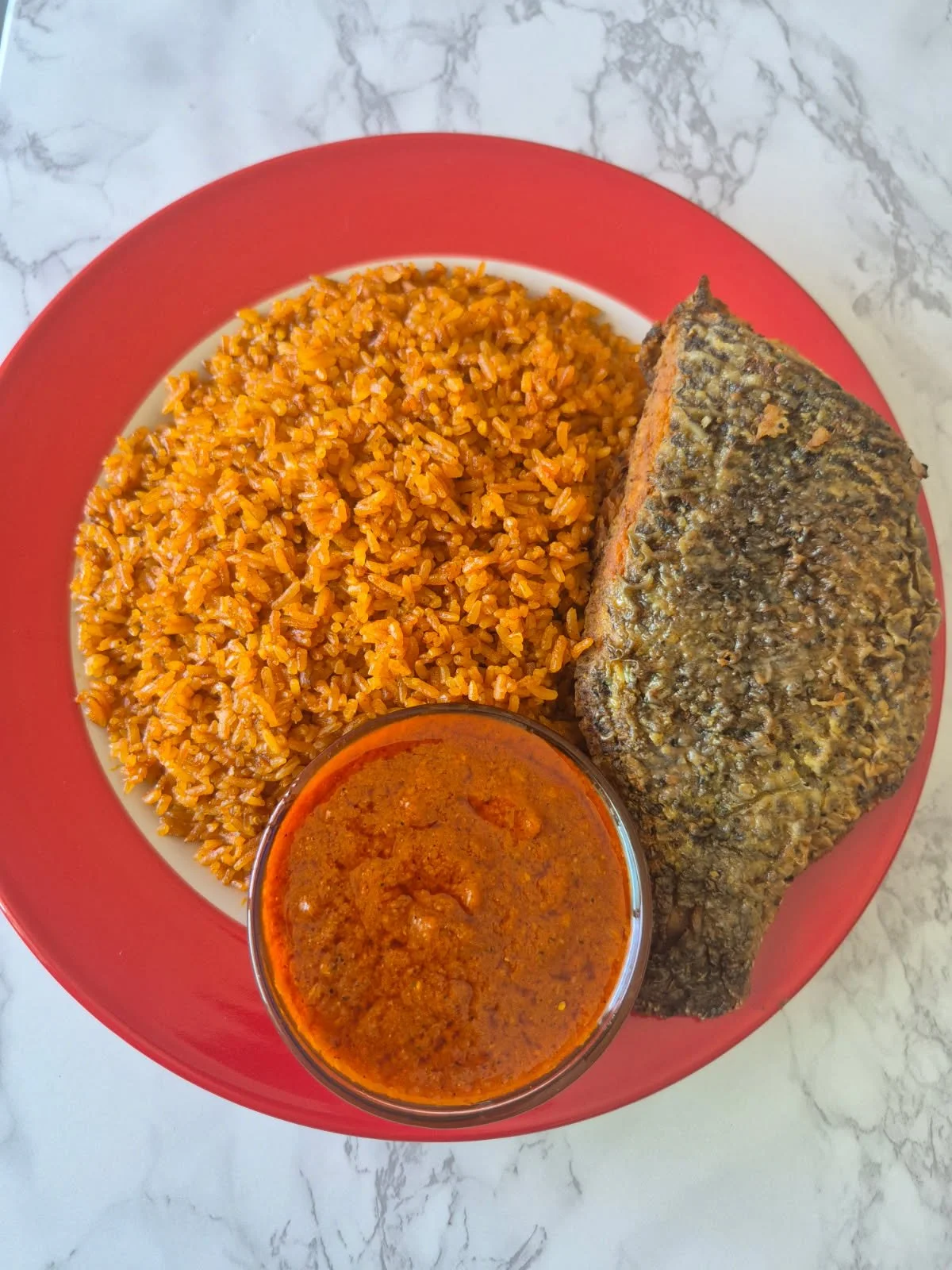 Jollof Rice with Fired Fish & Red Bell Pepper Sauce