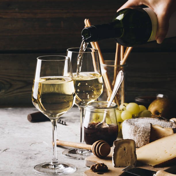 white wine in glasses on table.jpg