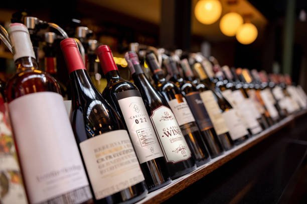 wine bottles on a shelf.jpg