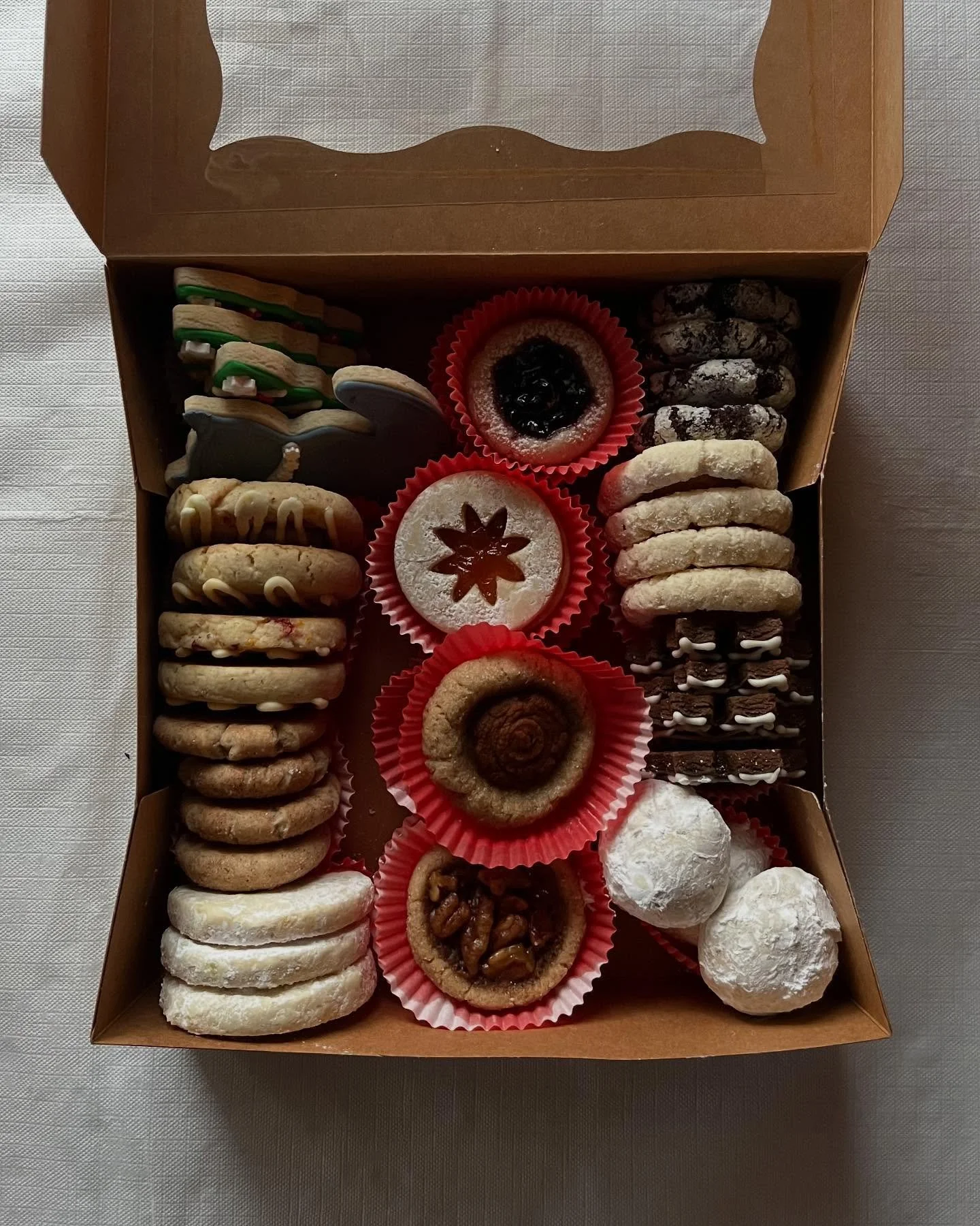 Throwback to our annual Christmas cookie box surprise from our head baker. Each year she bakes these cookie boxes for family and friends. These boxes come with a variety of Christmas cookies that will leave you stunned upon opening them. These may or