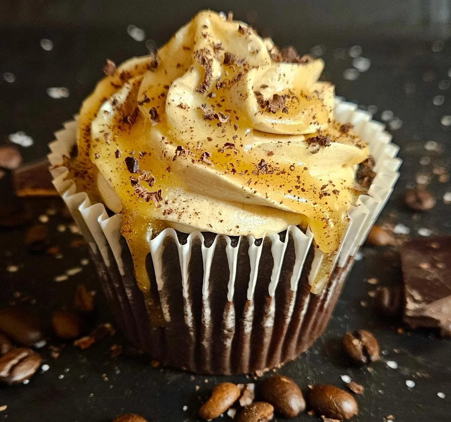 It&rsquo;s time for our next menu reveal! Introducing our delectable Salted Caramel Mocha cupcake 🧁 

Our rich (never boxed) chocolate 🍫 cake 🎂 is filled with our homemade vegan caramel sauce, topped with espresso buttercream frosting, and drizzle