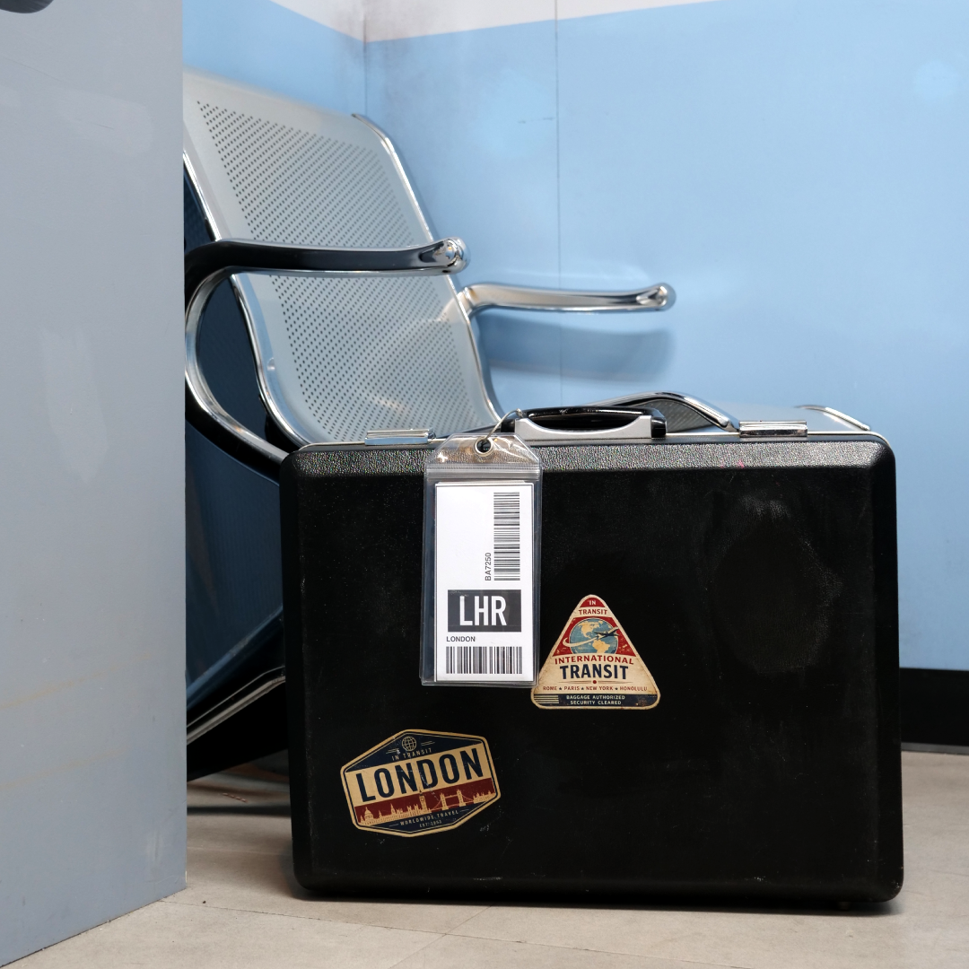 Briefcase and retro prop chair in the gate area of the Turbulence escape room, Sydney