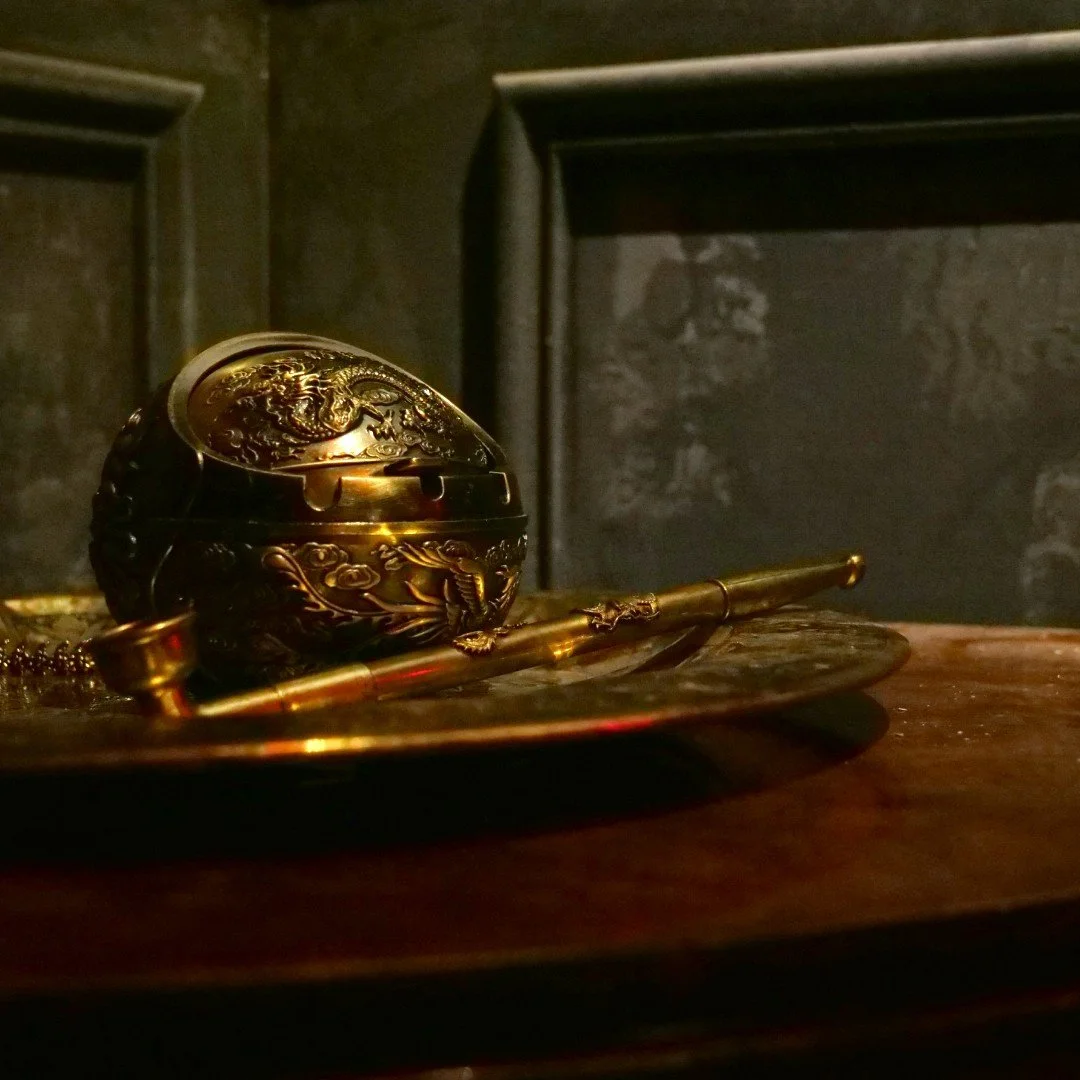 Opium pipe and ashtray props in Kidnapped's Chinatown-themed escape room, Rosebery, Sydney