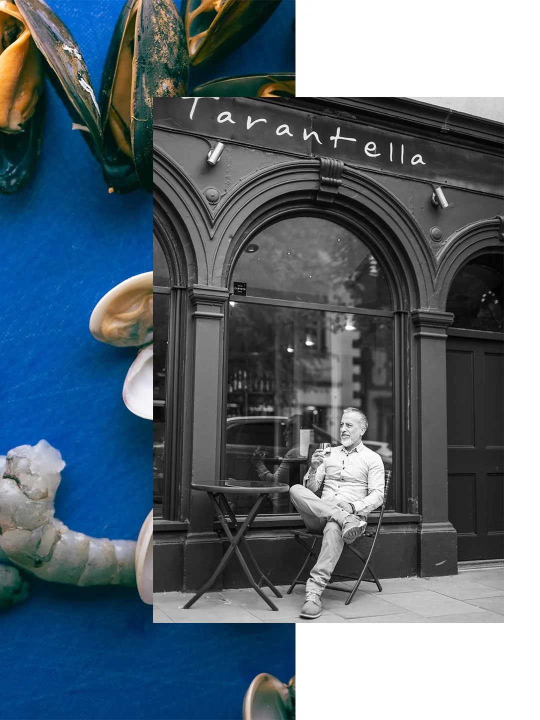 A man sitting outside a café, holding a glass of wine, in front of a window with an ornate arched frame and a sign that reads "Tarantella".
