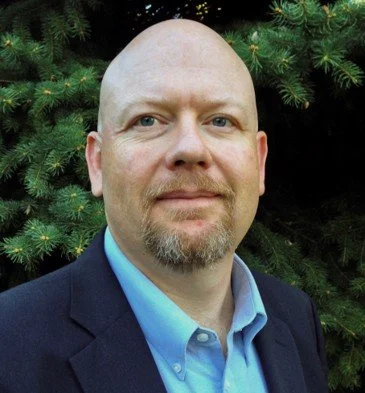 Professional headshot of Charles Radman, Global Education Technology Expert and former Global Head of Education for HP.