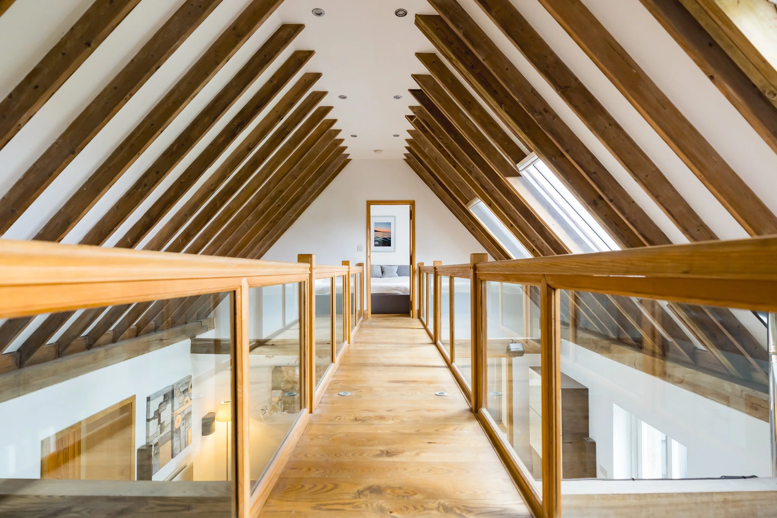 The mezzanine walkway on the first floor of the luxury holiday home barn in Sea Palling Norfolk