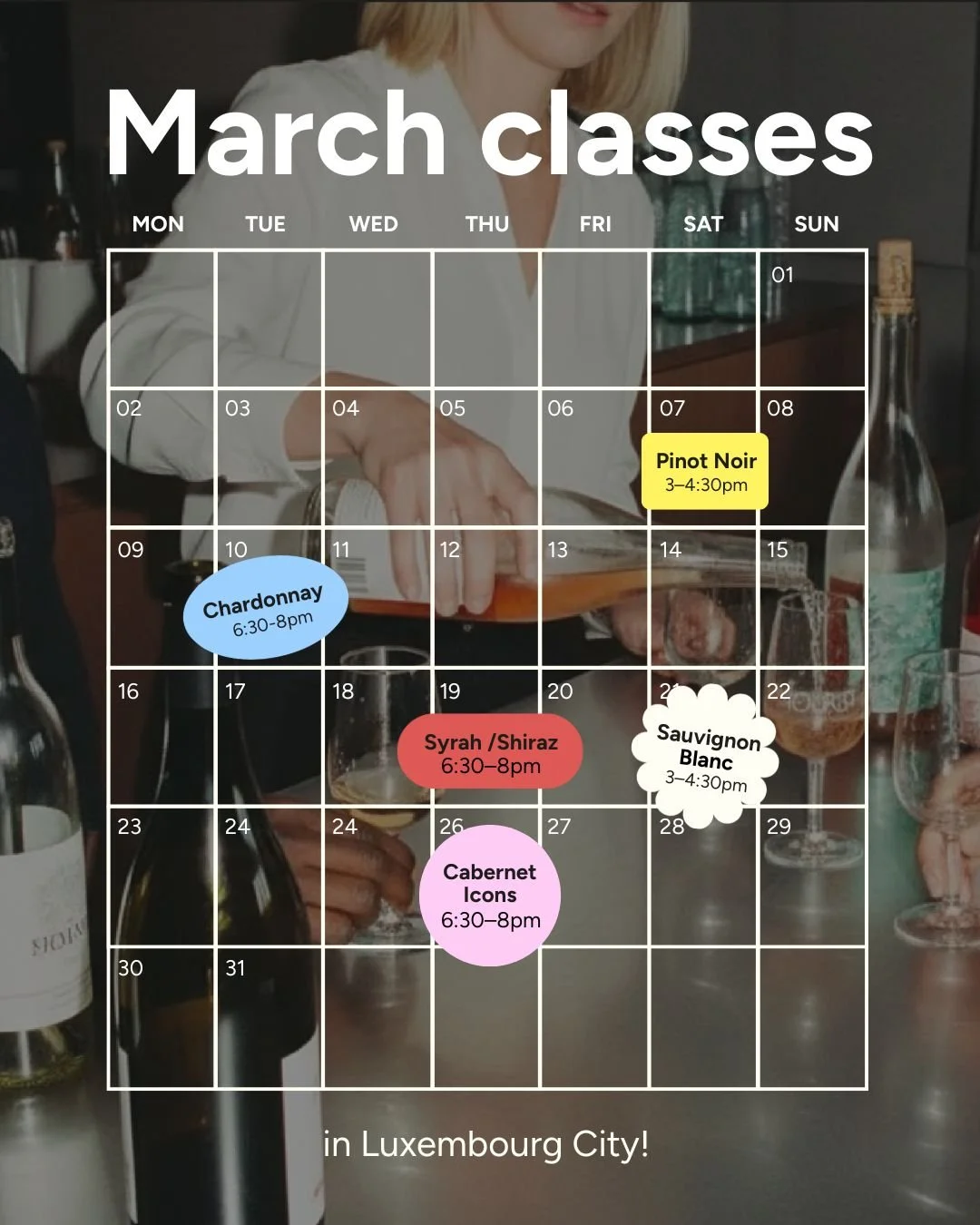 A calendar for March labeled "March classes" with wine tasting events listed on specific dates. The schedule includes Chardonnay on the 10th from 6:30 to 8 pm, Pinot Noir on the 7th from 3 to 4:30 pm, Syrah/Shiraz on the 19th from 6:30 to 8 pm, Cabernet Icons on the 26th from 6:30 to 8 pm, and Sauvignon Blanc on the 21st from 3 to 4:30 pm. The background features a person pouring wine and various wine bottles and glasses on a table.