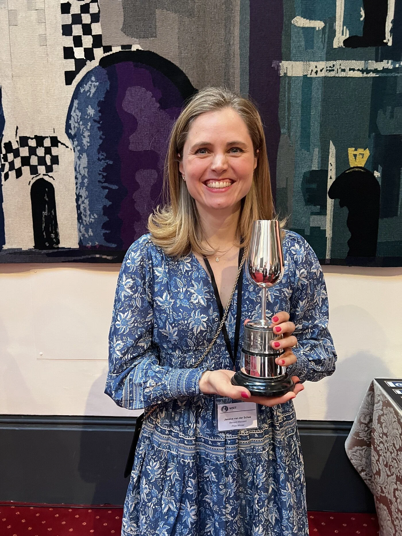Jess holding the 2023 Lustau Sherry Trophy