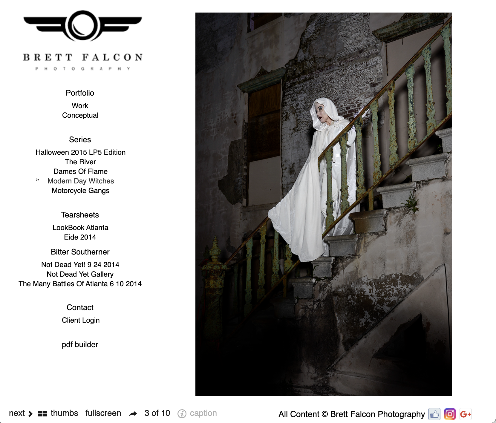 A woman dressed as a ghost in a long white gown and hood, standing on an old, rusty staircase in a dilapidated building with crumbling walls and peeling paint.