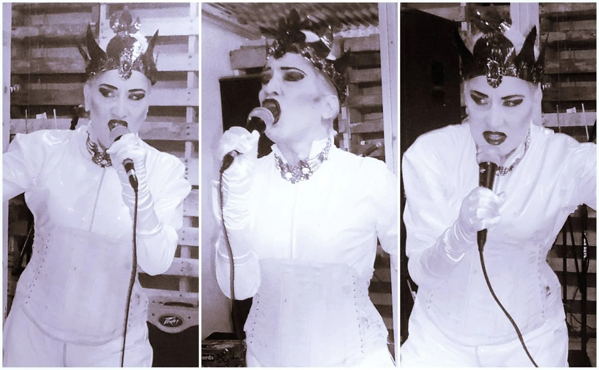 A woman dressed in a white outfit with an ornate headpiece, holding a microphone and singing, shown in three different poses against a wooden background.
