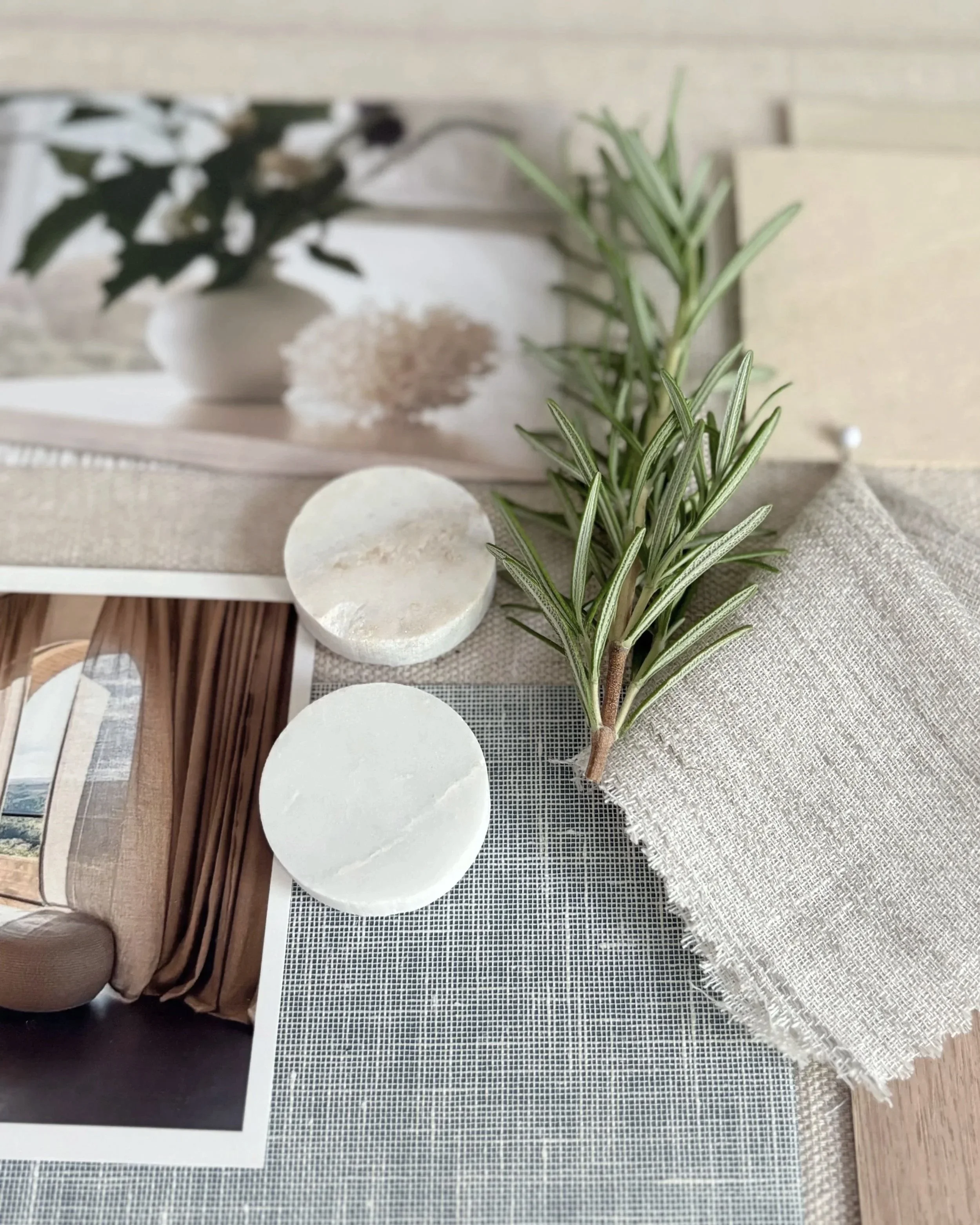 Natural stone and materials curated by OLEILU for a wellness-focused home