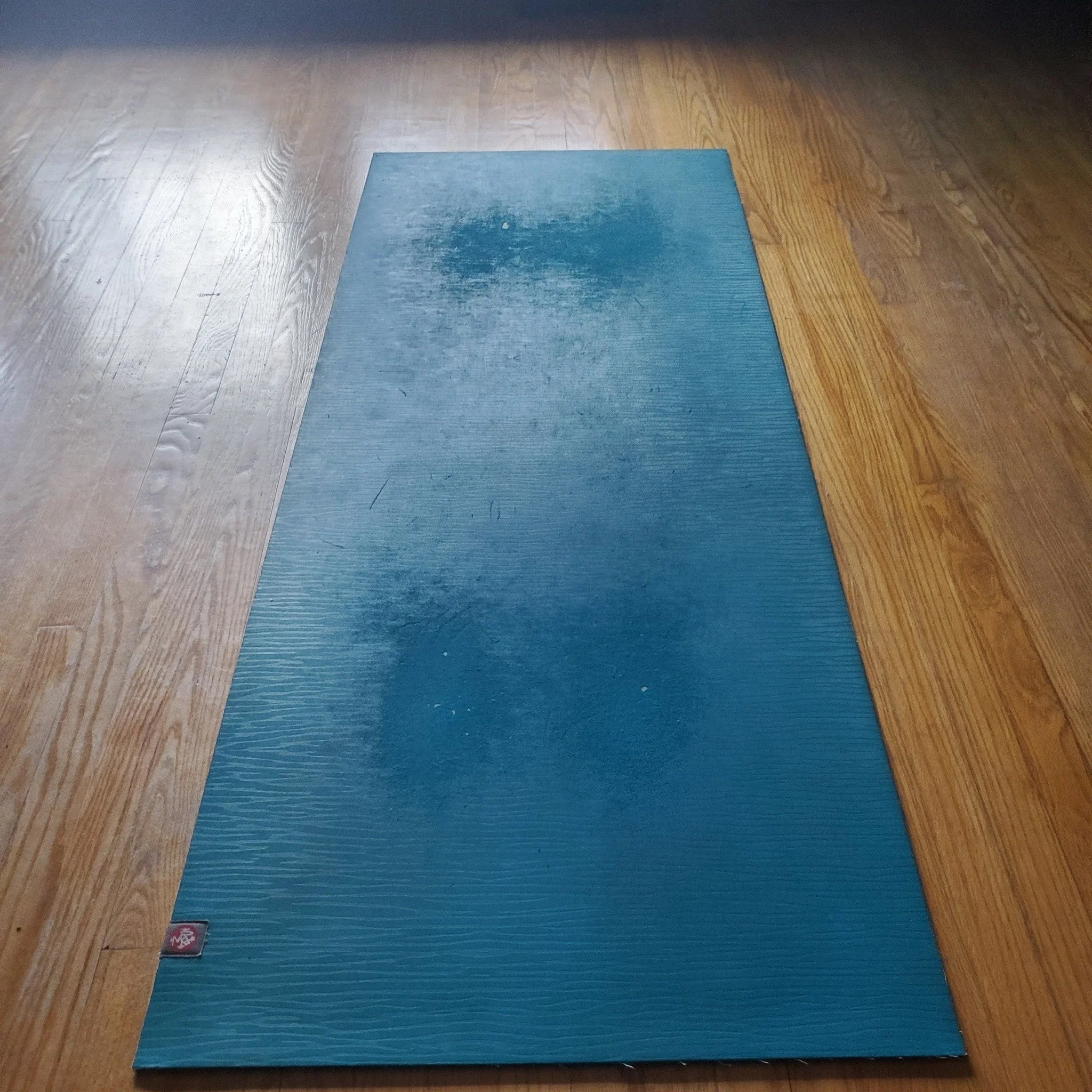 Saying Goodbye!

I've had this Manduka Eko Yoga mat for nearly 8 years, the same number of years I've ben leading participants through yoga practices.

It has served me well, and it's crumbling beneath my hands and feet.

No worries I have already be