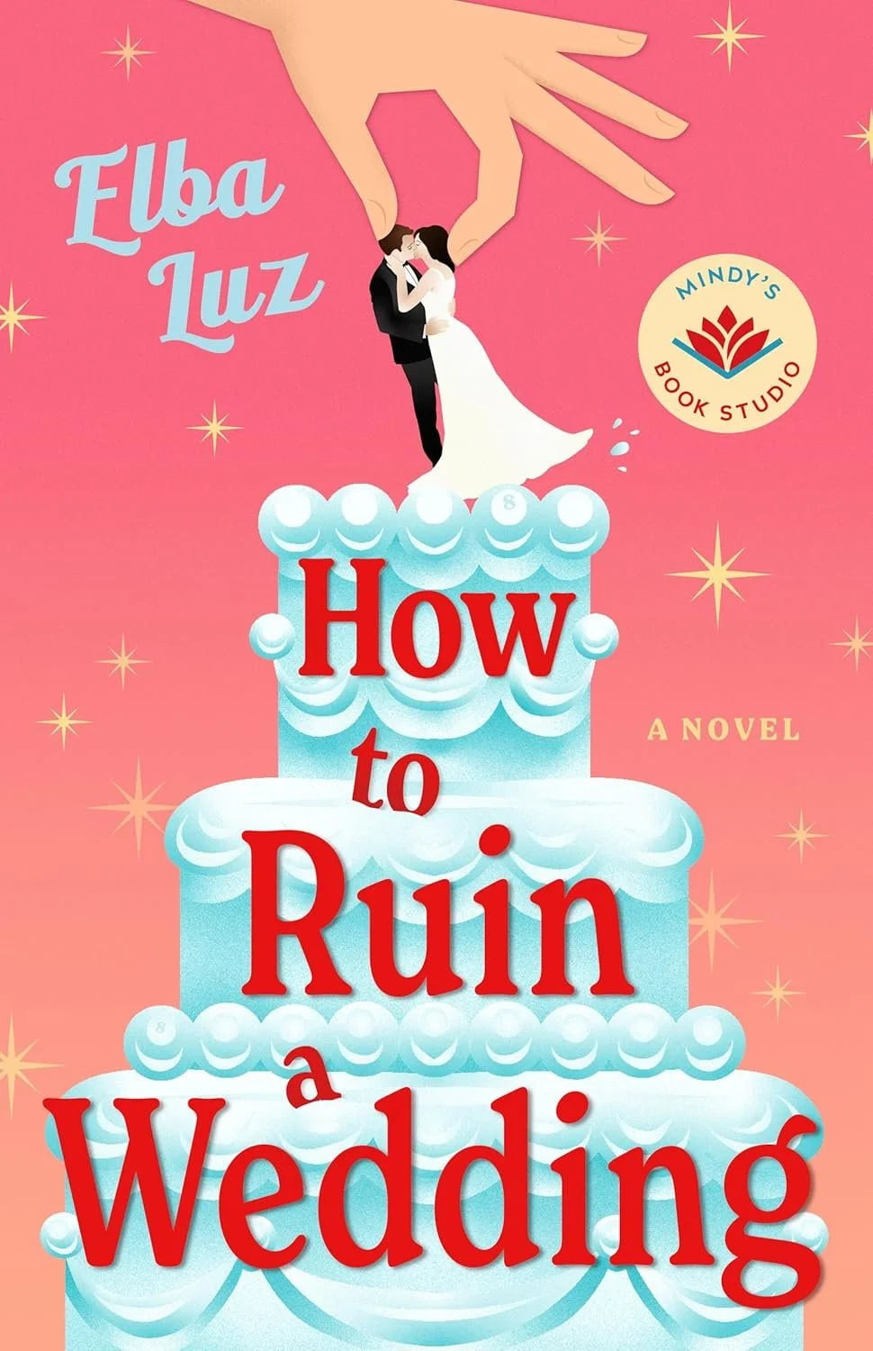 Book cover for 'How to Ruin a Wedding' by Elba Luz. Illustration of a bride and groom standing on a wedding cake with a giant hand holding them, set against a pink background with stars. Logo for Mindy's Book Studio.