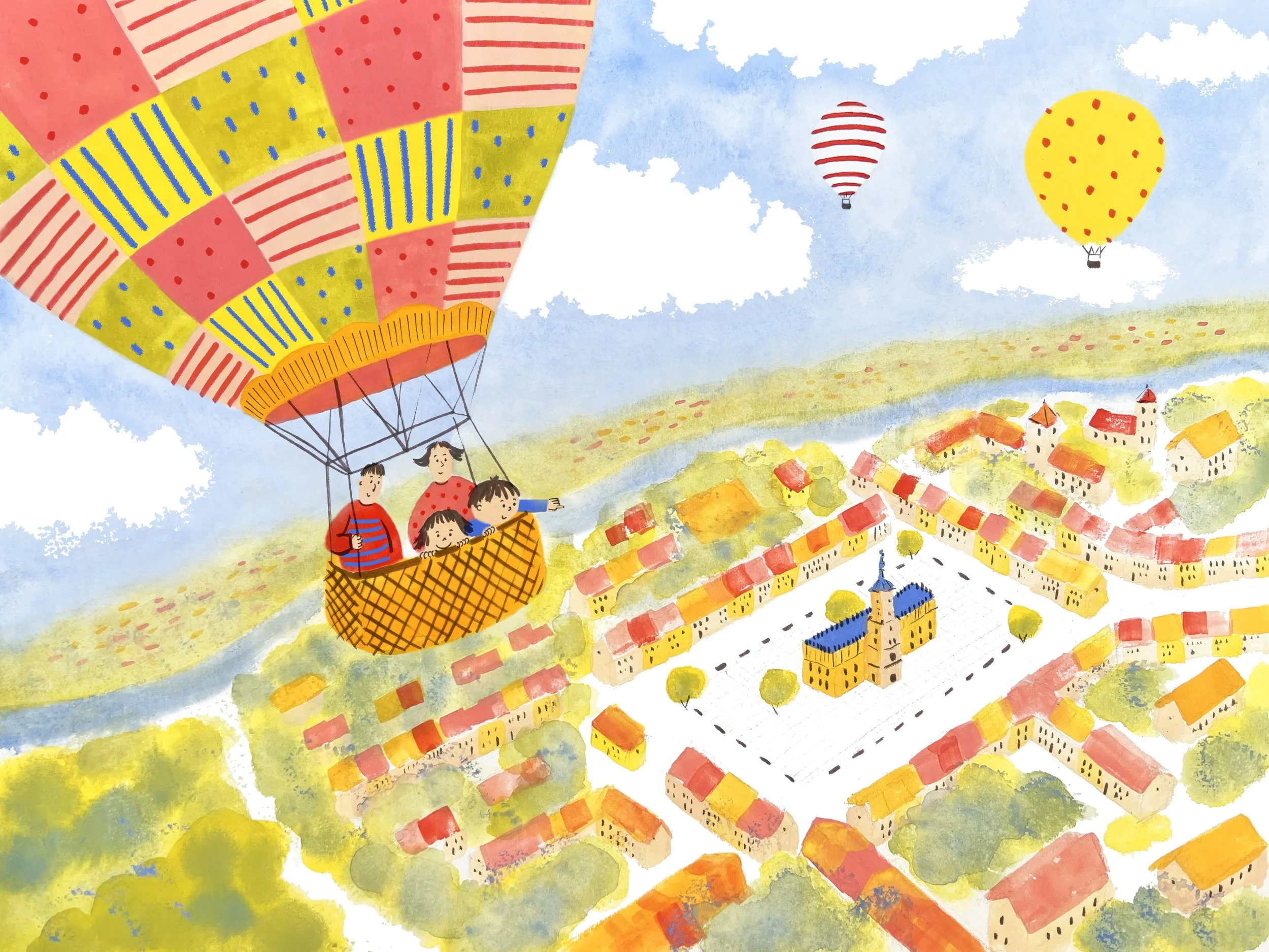 A family floating in a hot hair balloon looking down at the town below them