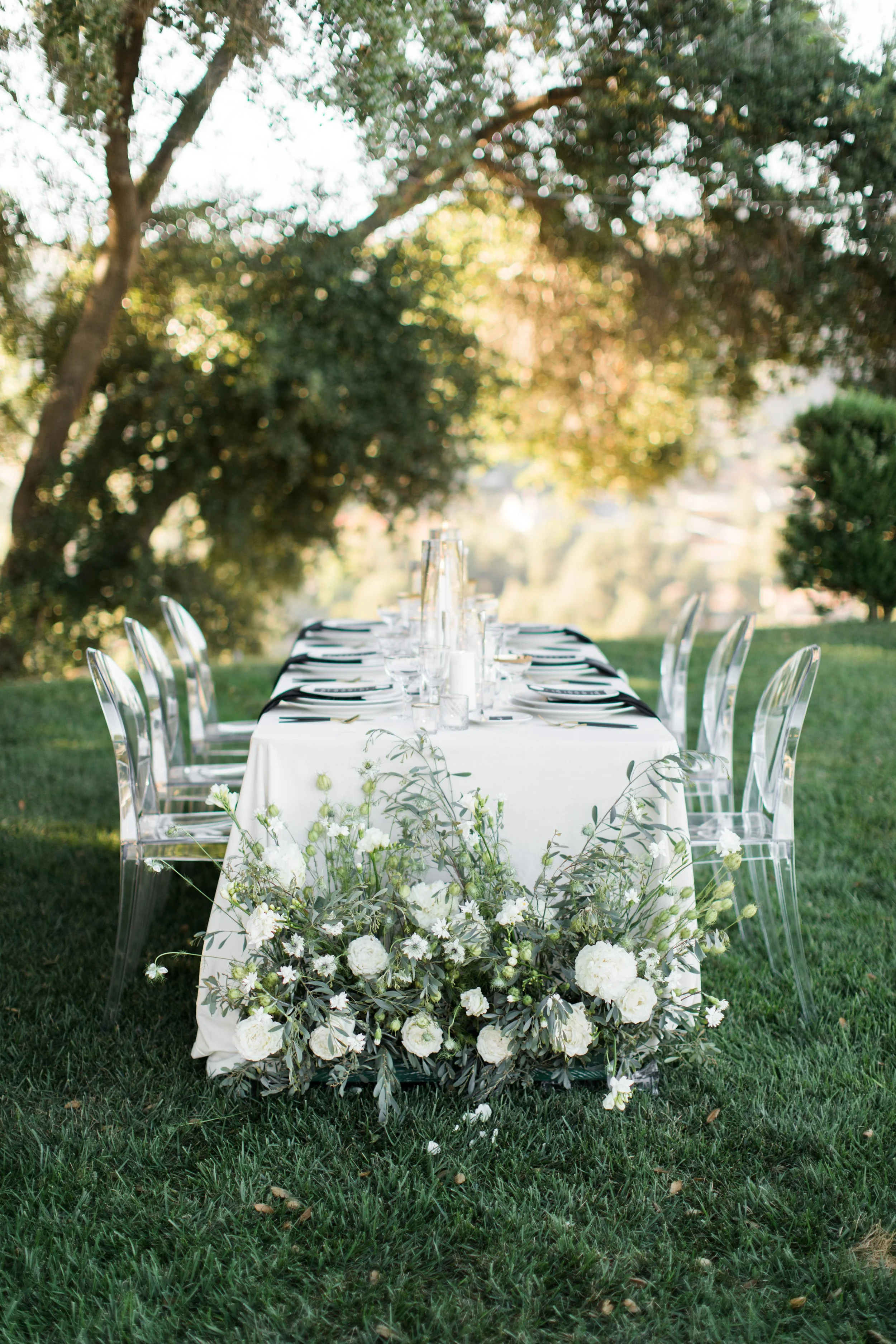 Elegant black and white wedding tablescape designed by a Hudson Valley wedding planner using a refined wedding design process.