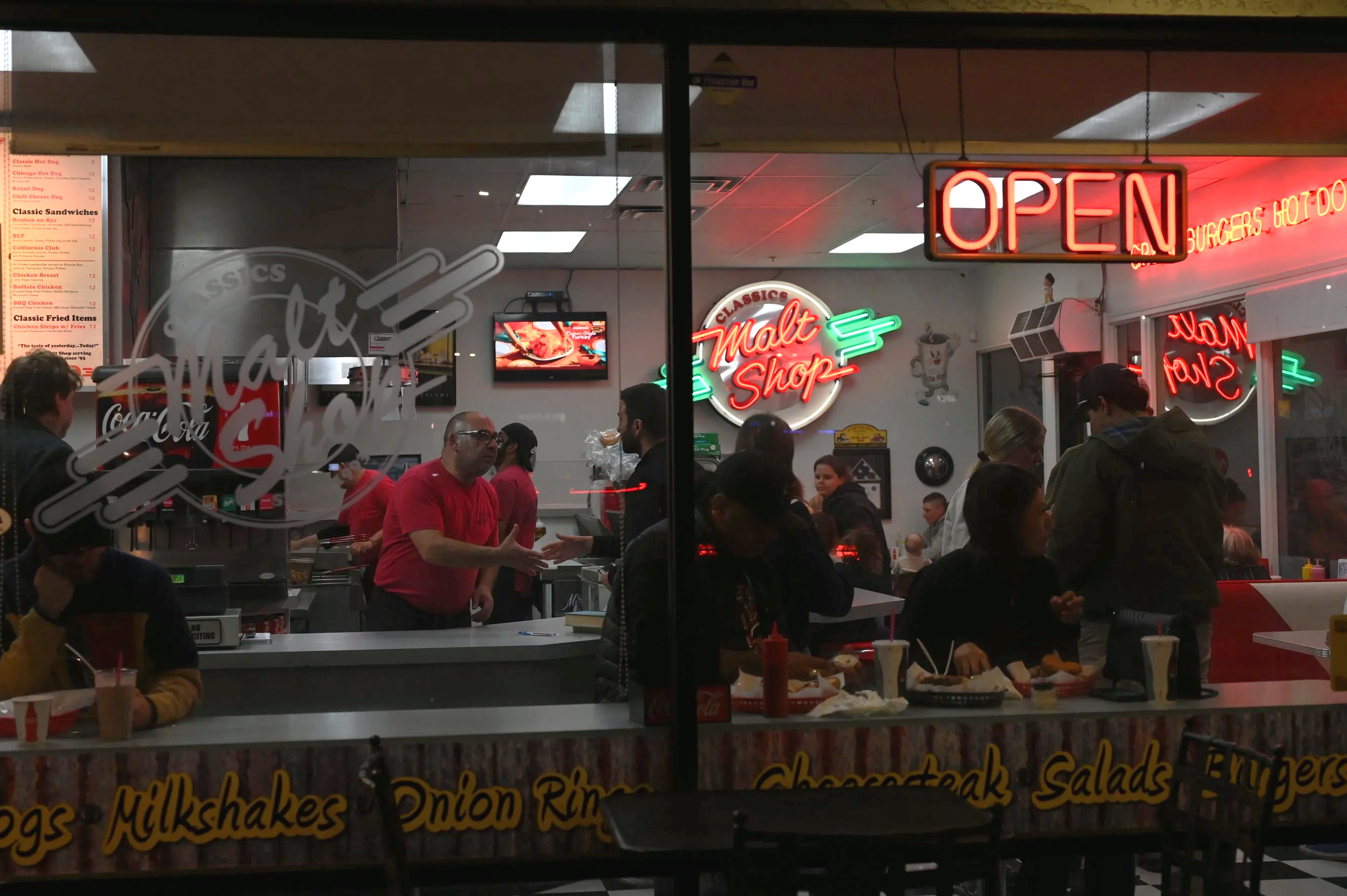 Farris demonstrating the amazing customer service at the legendary Classics Malt Shop in Point Loma California.