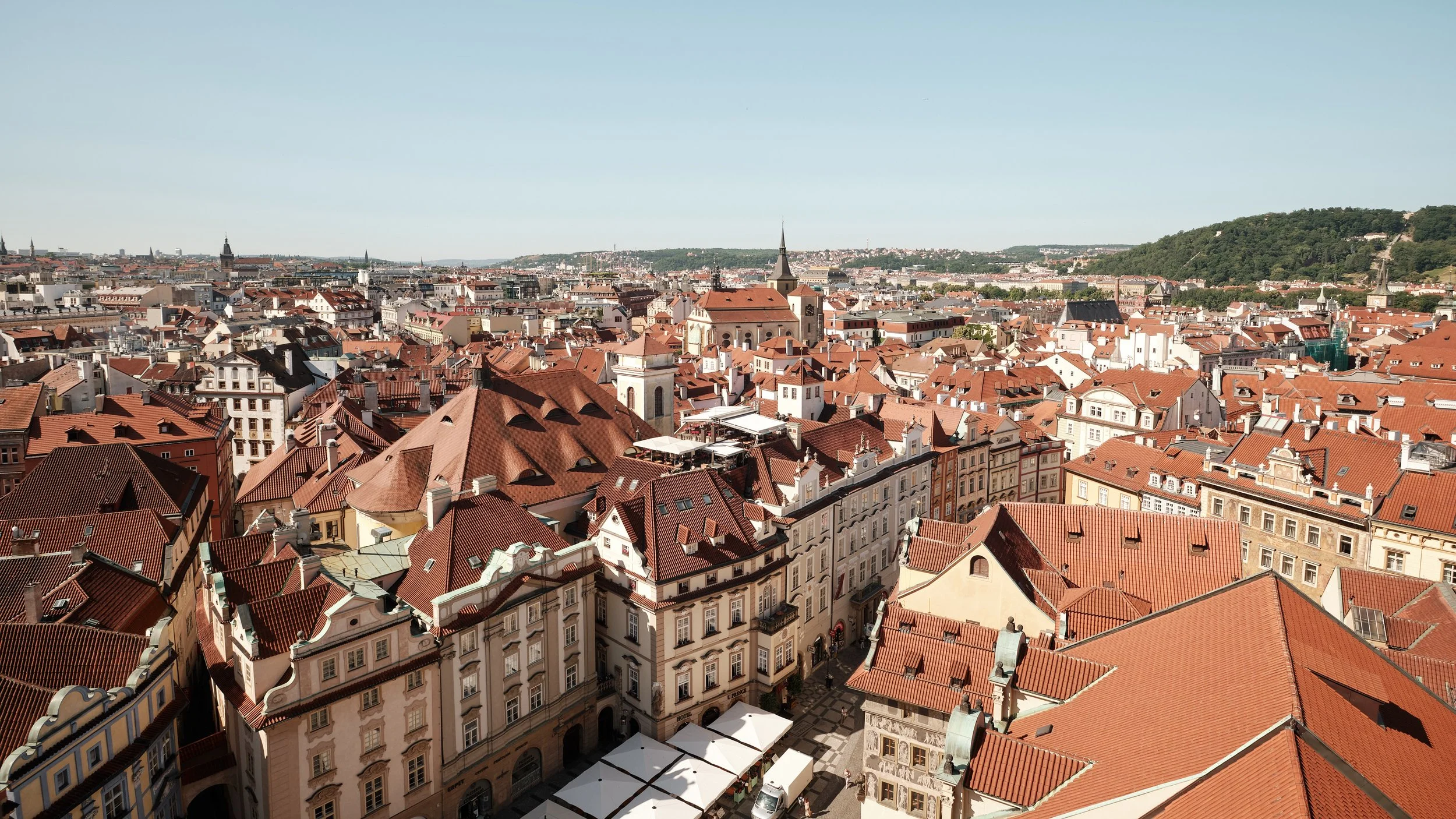 Looking across the city’s historic center, every rooftop tells part of Prague’s story. Gothic towers, Baroque façades, and quiet courtyards weave together into one of Europe’s best-preserved urban landscapes.