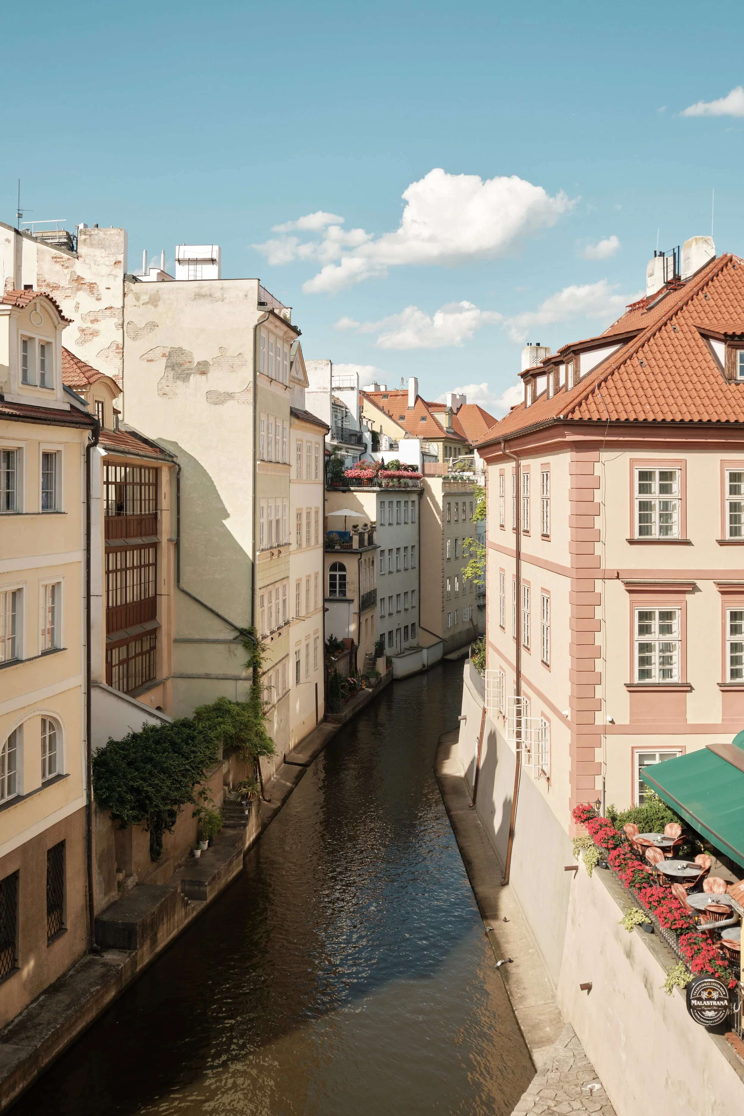 The canals of Prague weave through historic neighborhoods, reflecting centuries of architecture and everyday life. Away from the crowds, these quiet waterways reveal a more intimate perspective of the Czech capital.