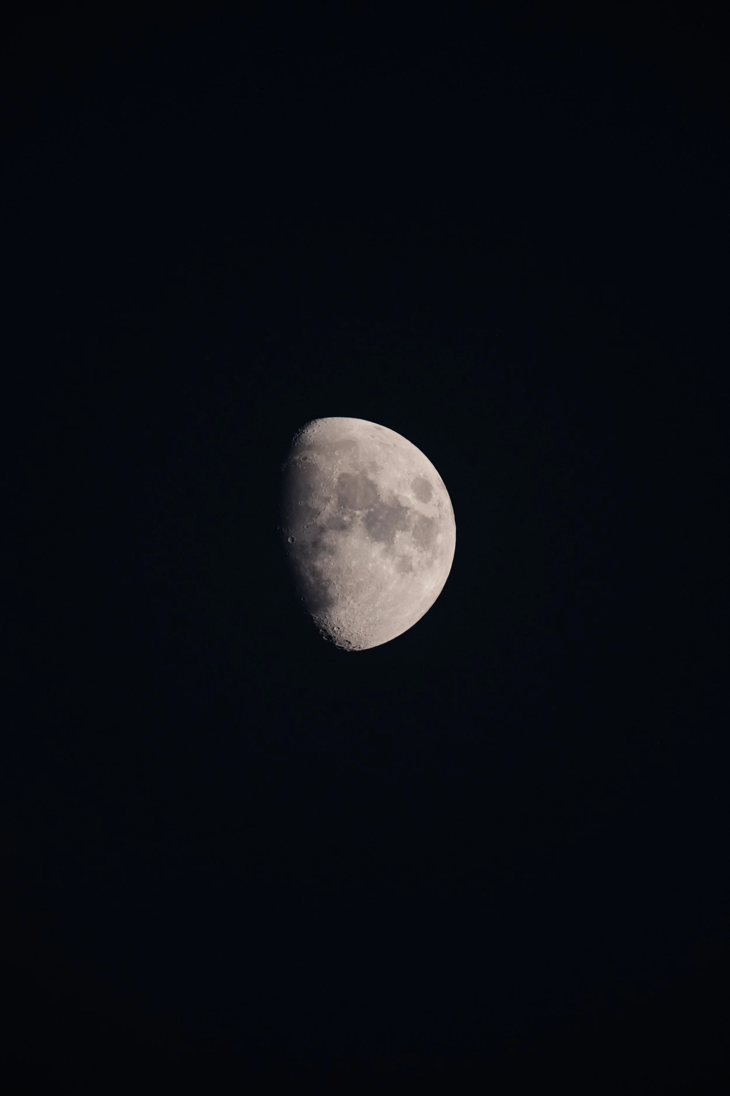 The last light faded. The moon remained.