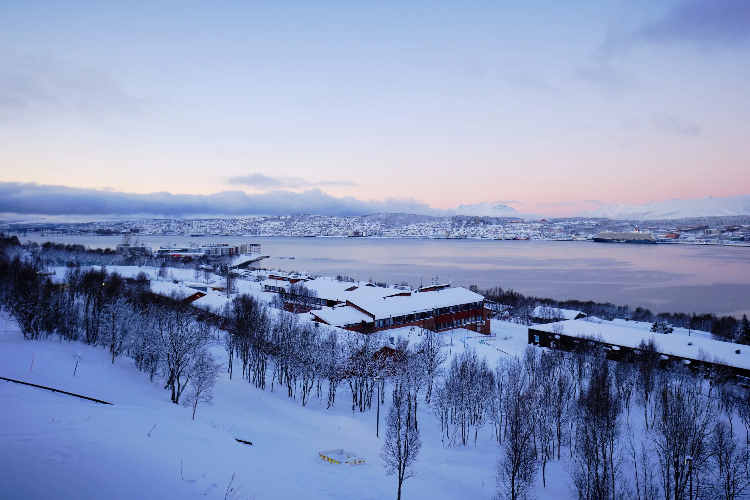 The Arctic welcomed me with a lesson in patience. A snowstorm had cancelled my flight the day before, reminding me that nature would always decide the schedule here. Then came this morning. Crystal-clear skies, fresh snow stretching to the horizon, a