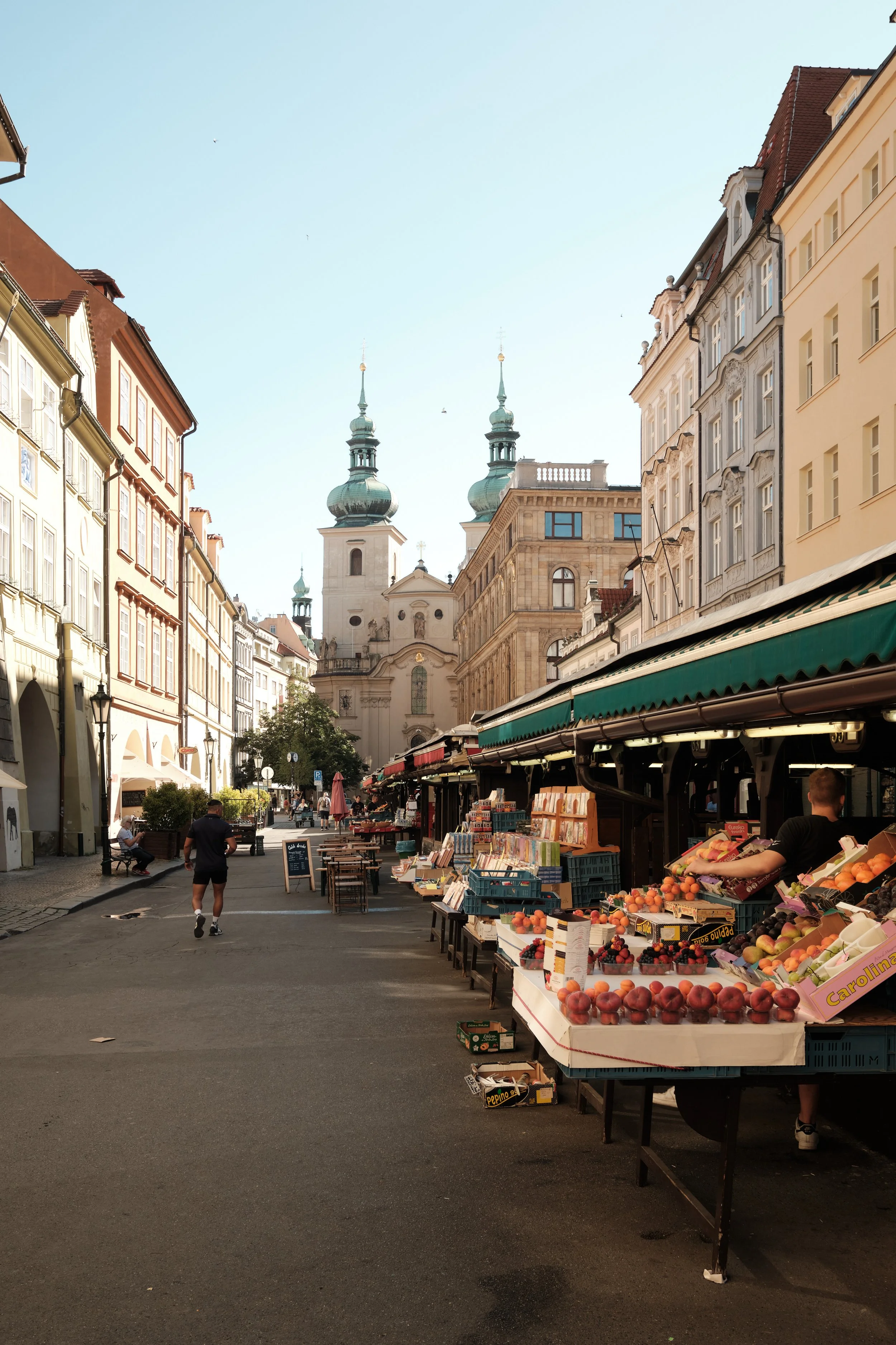 Morning Markets of Prague -

As the city slowly comes to life, colorful market stalls line the streets of Prague’s Old Town. Fresh produce, local flavors, and centuries-old architecture come together, capturing the everyday charm that makes the Czech